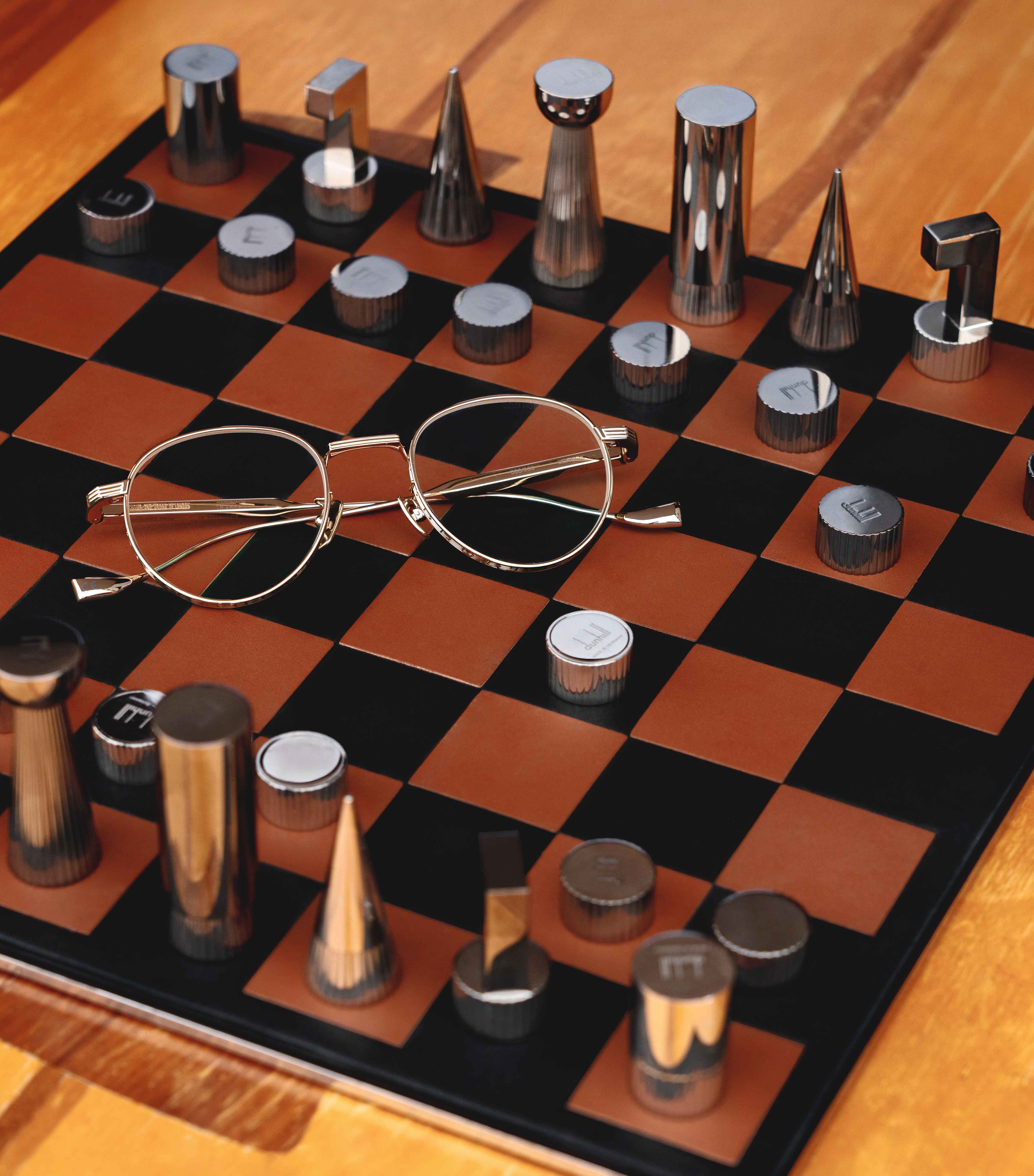Chess set, price on request, Dunhill. Lennox 1428 opticals, £560, Cutler and Gross