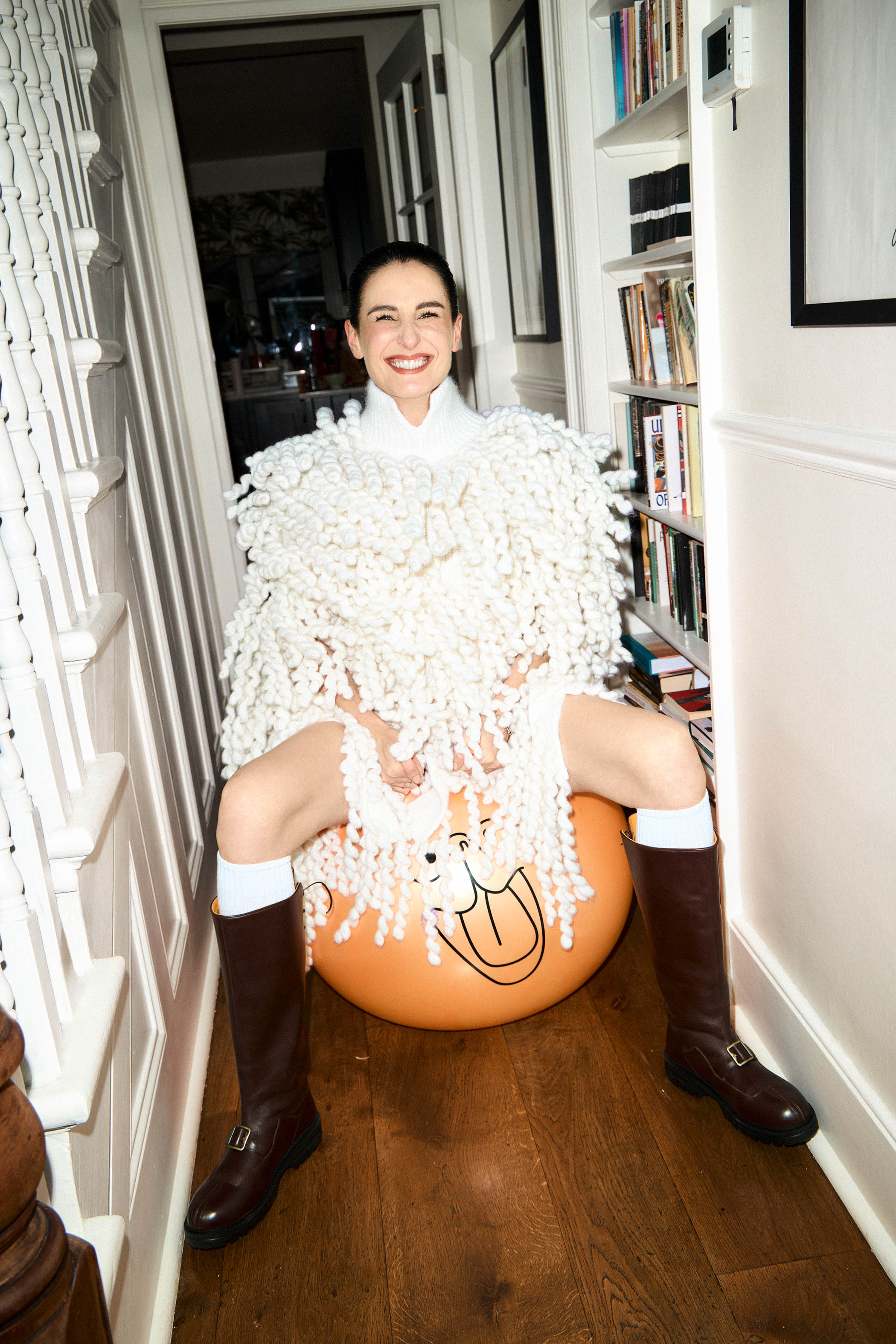 Fringed mohair cape, ring and bracelet, all by Burberry; Joan boots by Lili Curia