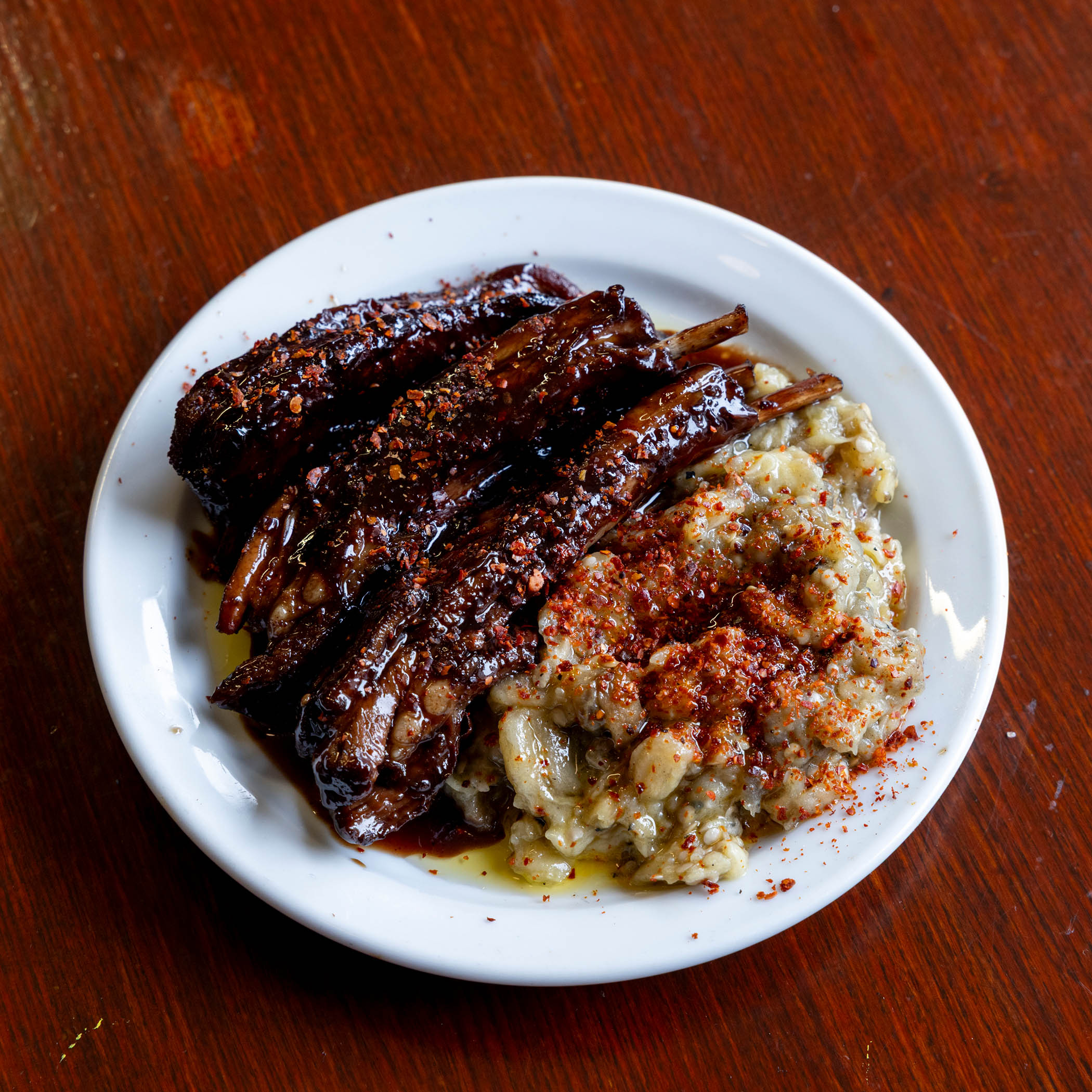 ‘Deliciously sticky’: lamb ribs, smoked aubergine mash