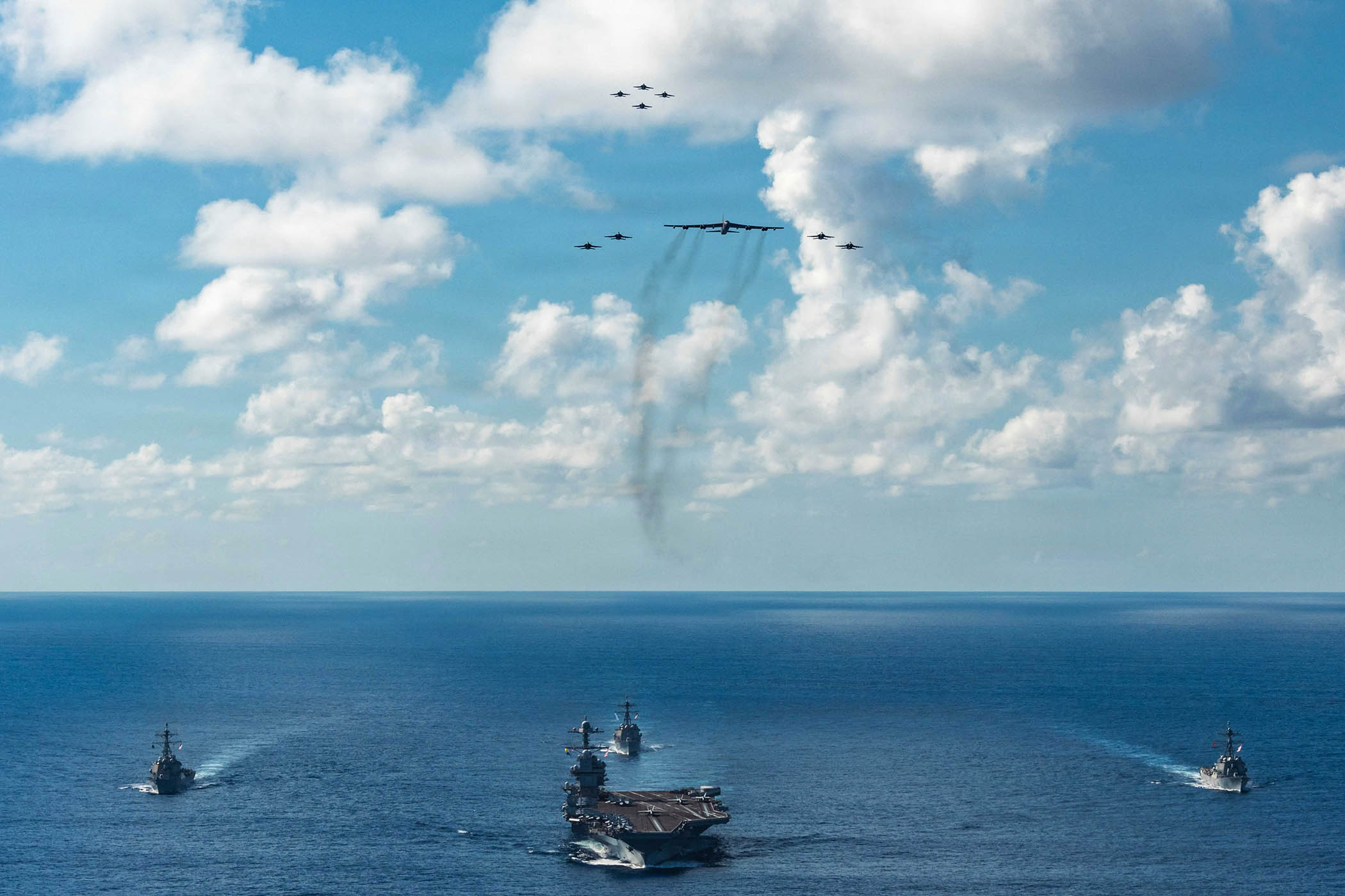 The USS Gerald R Ford carrier strike group, with its conginent of B-52 jets, in the Caribbean last week