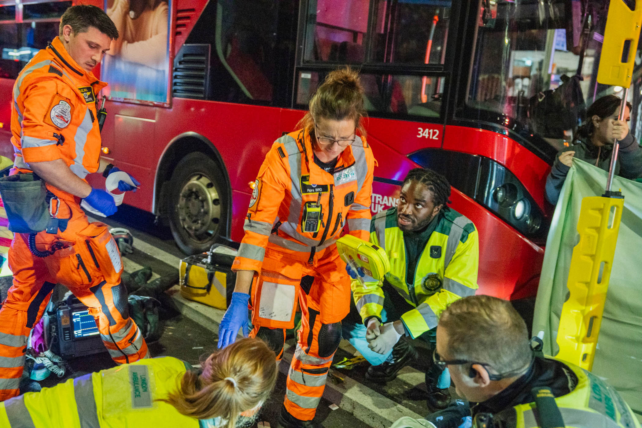 Baxter, Bird and colleagues prepare to transfer the patient to hospital