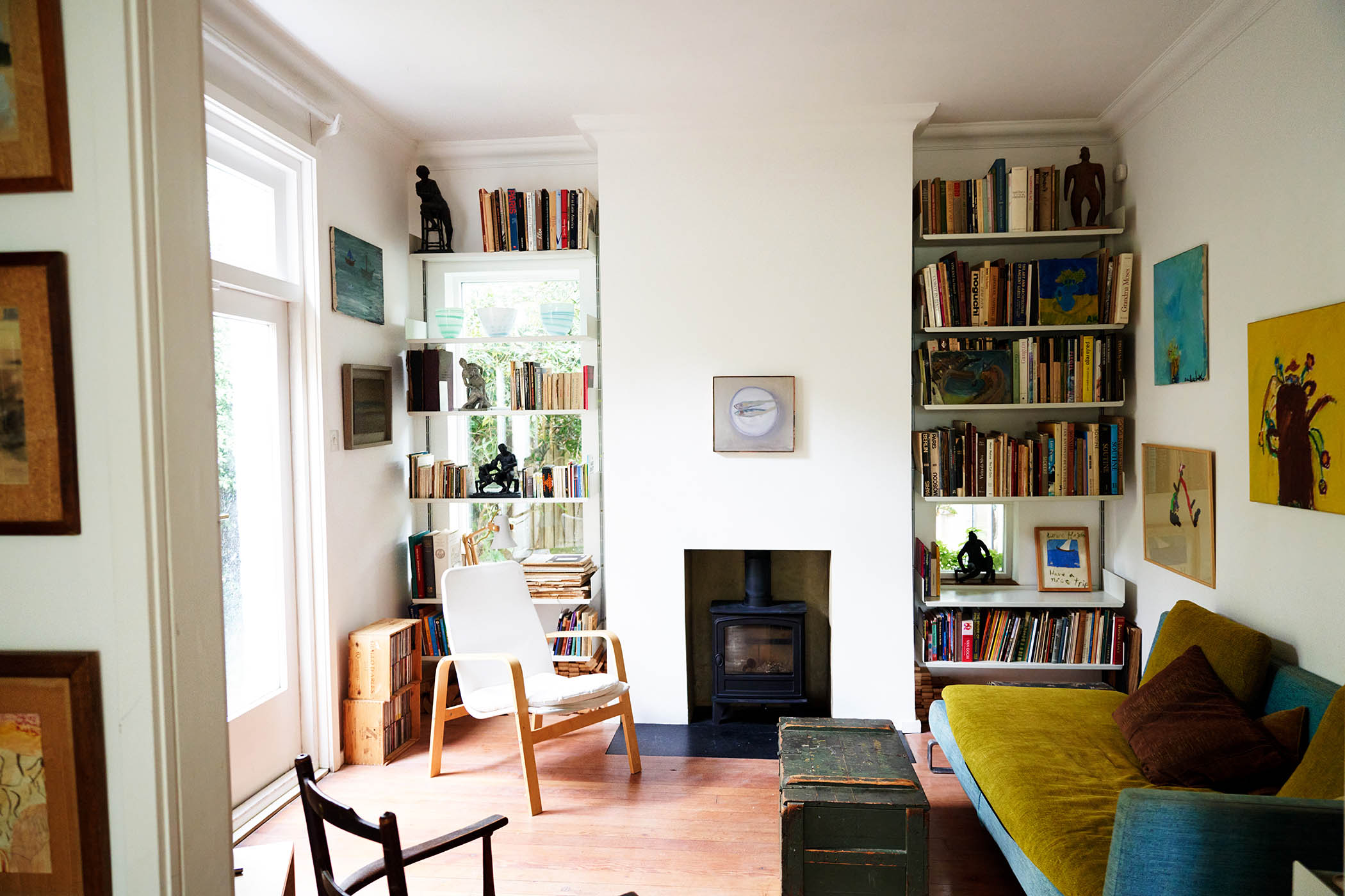 Let the light in: new windows in the sitting room on either side of the fire place