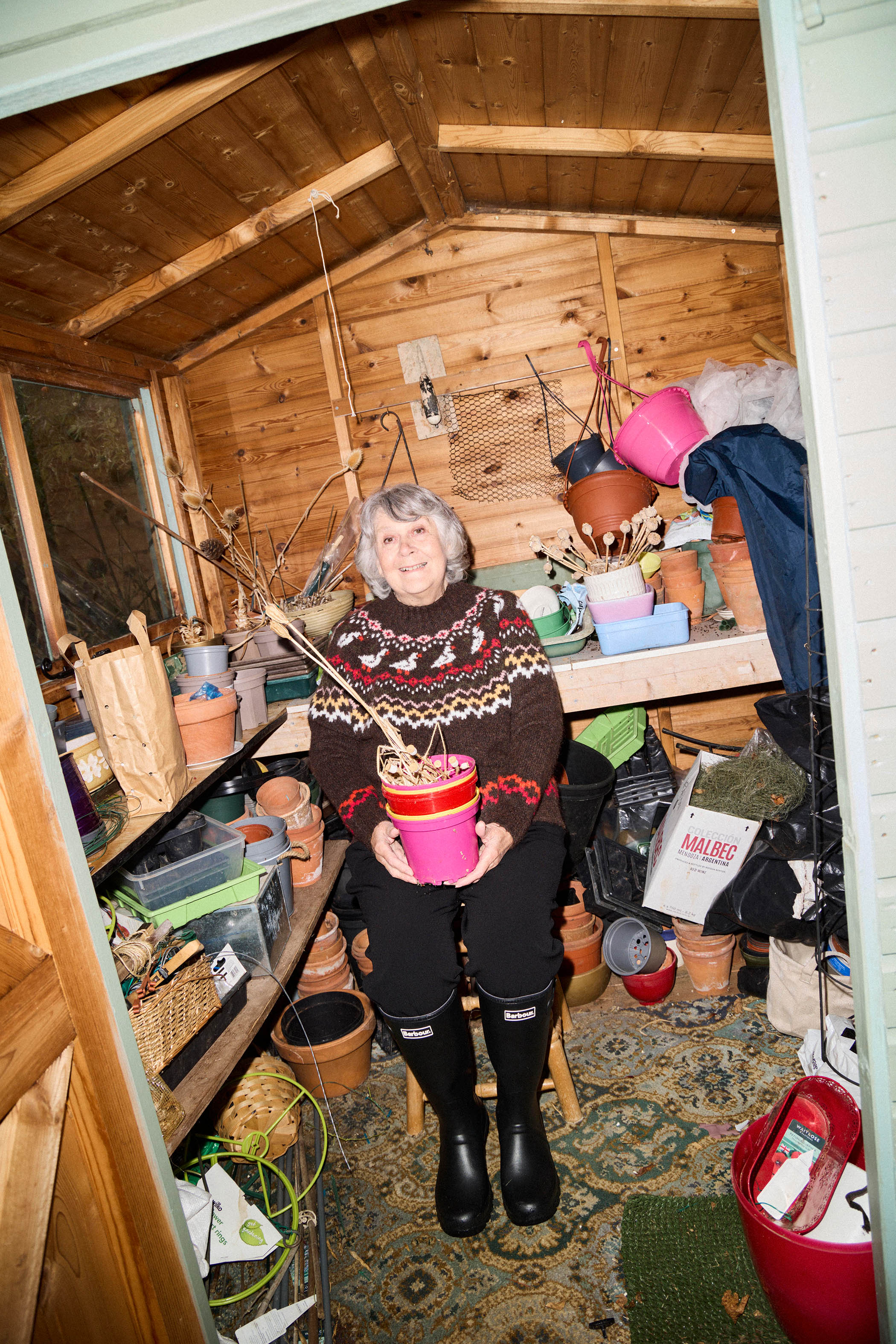 Teresa wears duck Fair Isle jumper £79, by Monsoon x Sarah Corbett-Winder; slim-leg trousers, £225, by The Fold London; and Tempest wellingtons, £109, by Barbour