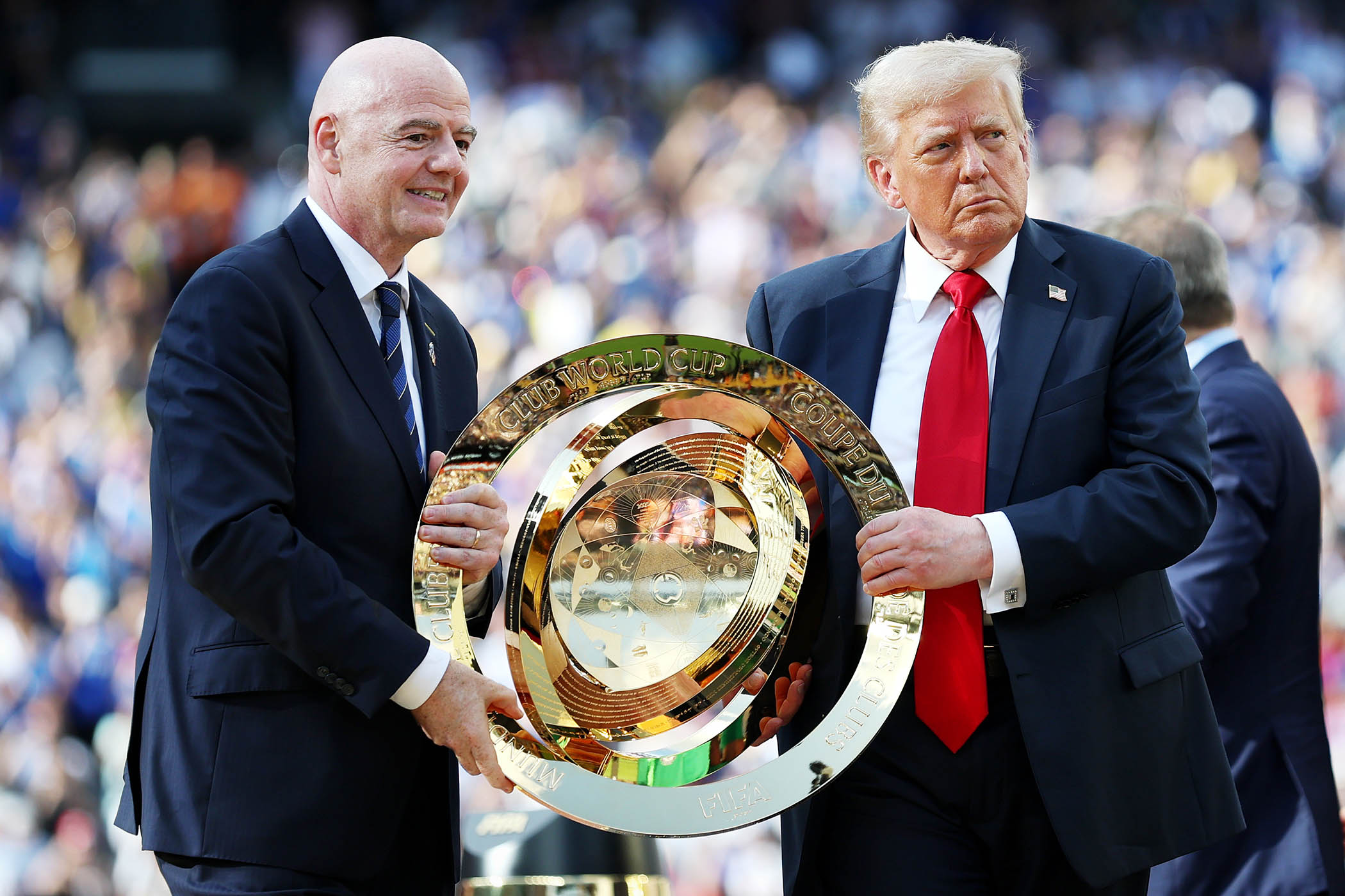 Gianni Infantino and Donald Trump hold the Fifa Club World Cup trophy at the final between Chelsea and Paris Saint-Germain at the MetLife Stadium in July. The US president later kept it.