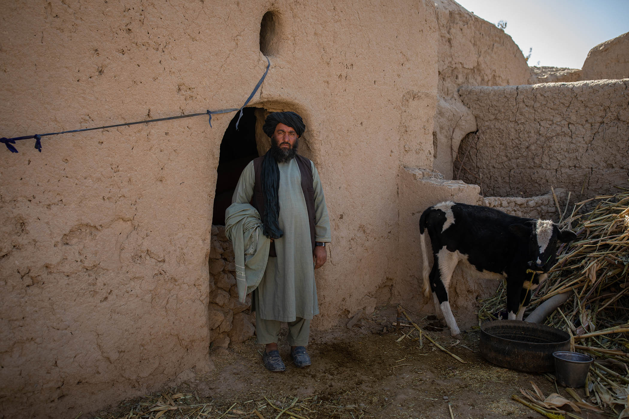 Obeidullah Karim stands in the spot where UK forces killed his father and brother during a raid
