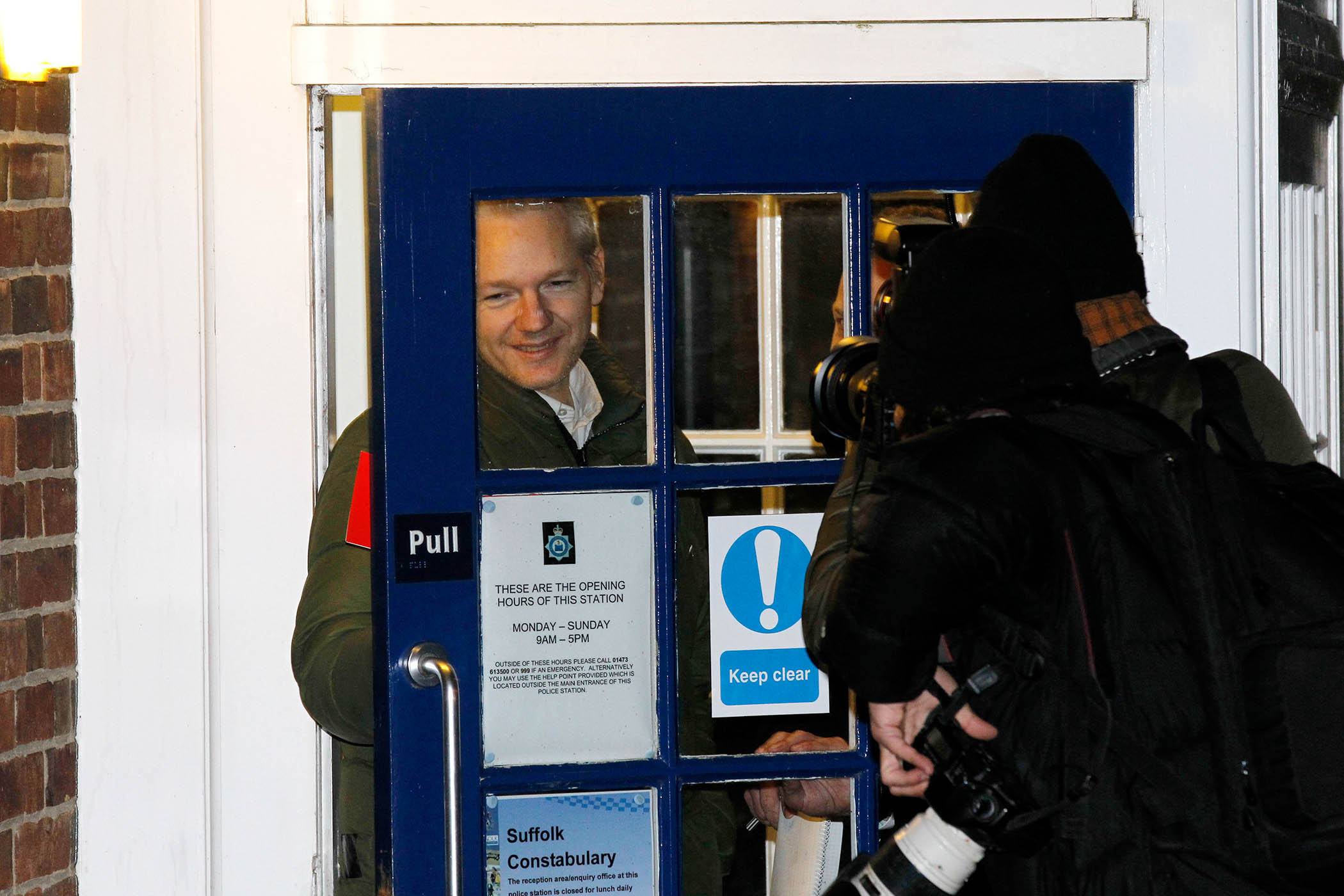 Julian Assange leaves a police station in Beccles in December 2010 after complying with bail conditions