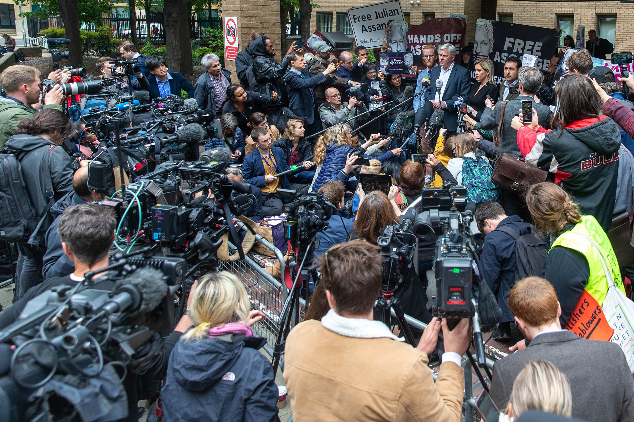Lawyers from Assange’s defence team speak to the media outside Southwark Crown Court after Assange’s sentencing in May 2019