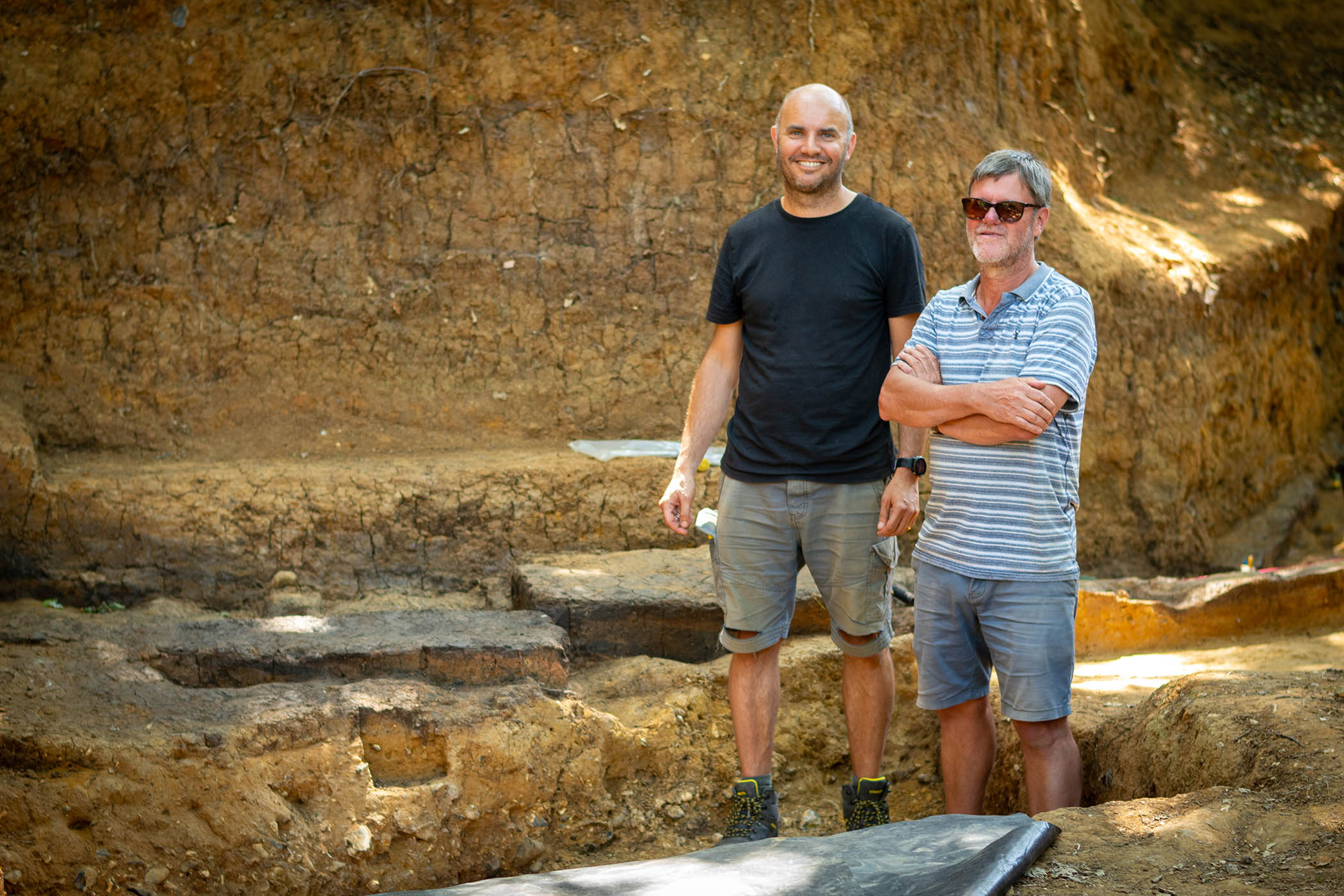 Dr Robert Davis, on left, with Prof Nick Ashton, who discovered the fireplace