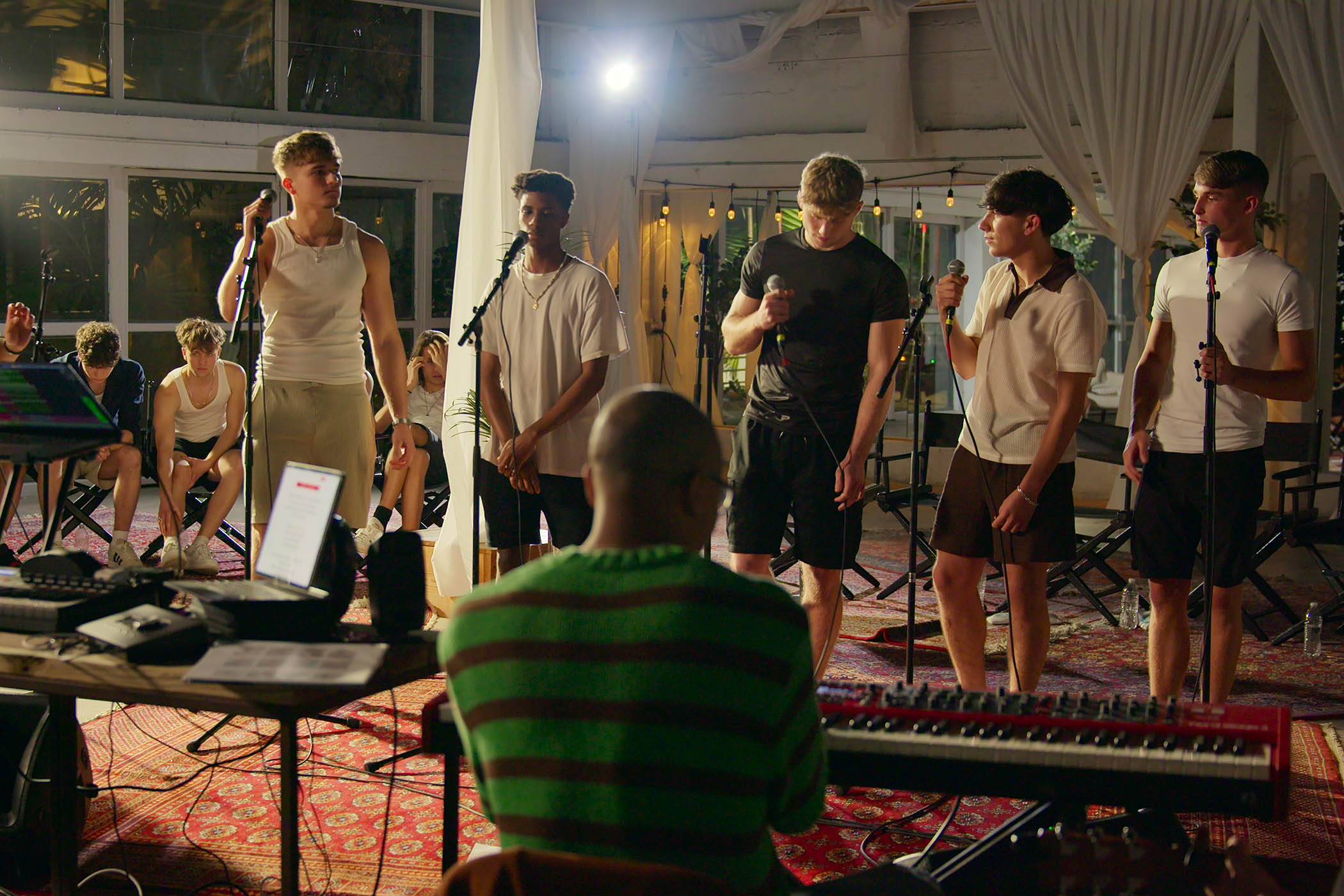 A boyband rehearses in Simon Cowell: The Next Act