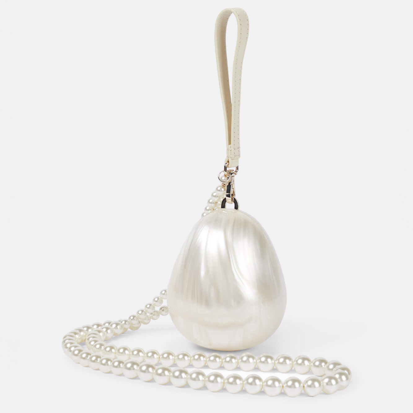 Egg embellished clutch, £475, Simone Rocha from Mytheresa