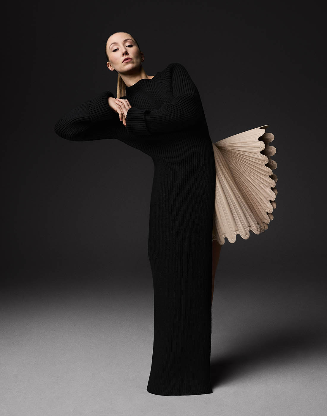 Wool maxi dress and leather pleated skirt, all byLouis Vuitton