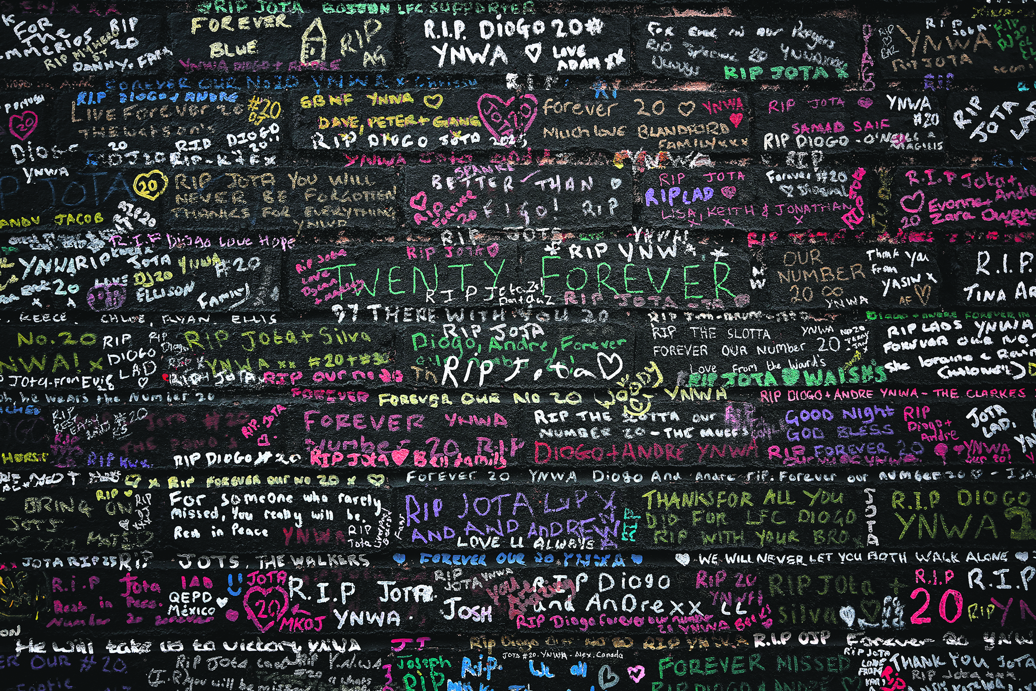 Tributes on a wall near Anfield