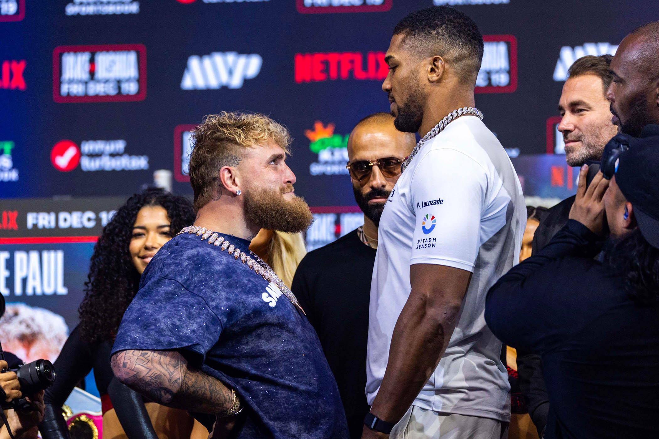 Anthony Joshua, 6ft 6in, faces Jake Paul, who claims to be 6ft 1in, at a press conference before the match, which lasted six rounds