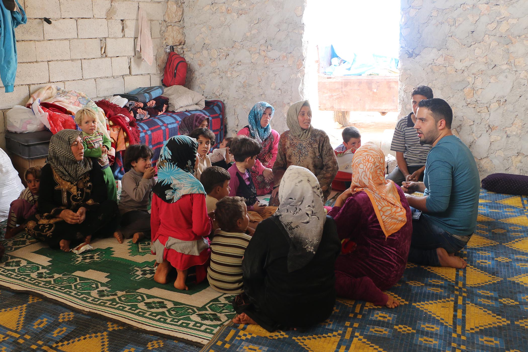 Parents and children in Aleppo, northern Syria, the home city of film-maker Hasan Kattan