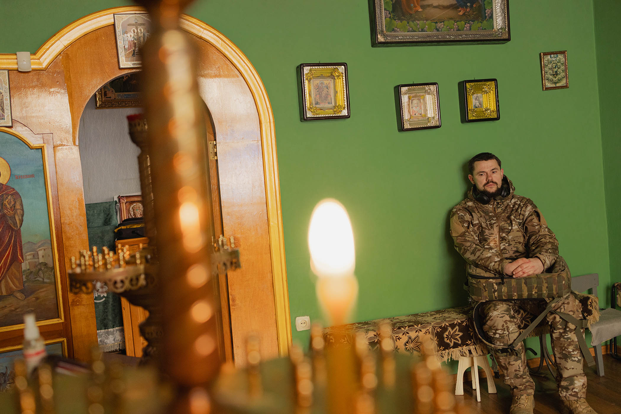 A serviceman inside the Ukrainian Orthodox church of Saint Andrew the First-Called in Sloviansk