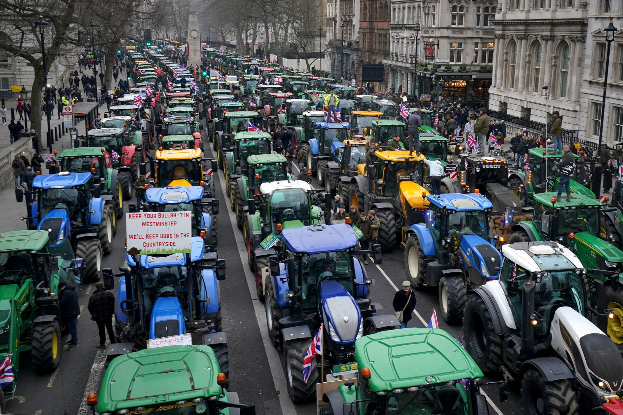Farmers block Whitehall with their tractors in a protest against the proposals last February