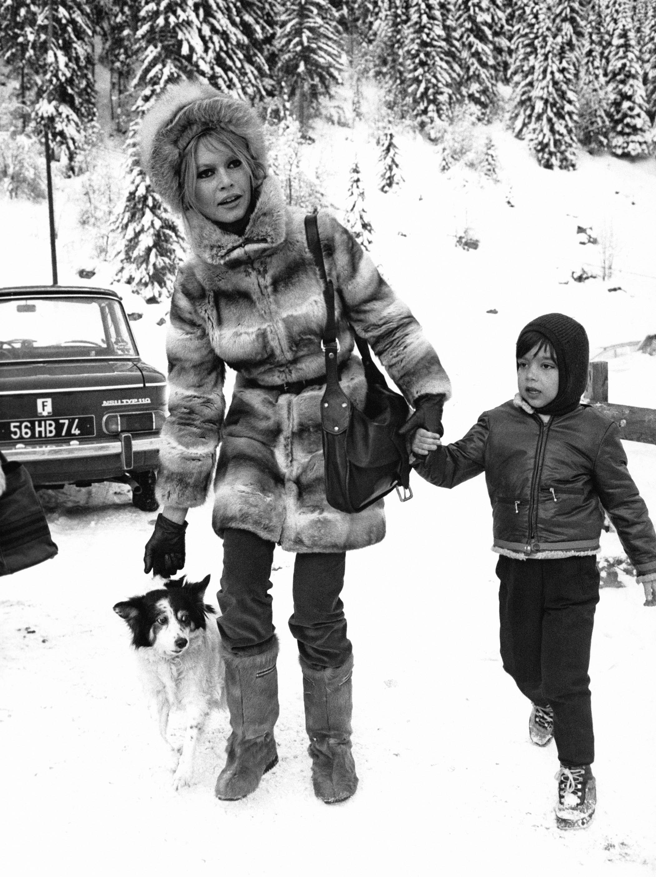 Bardot with her son, Nicolas, on a skiing holiday in 1960