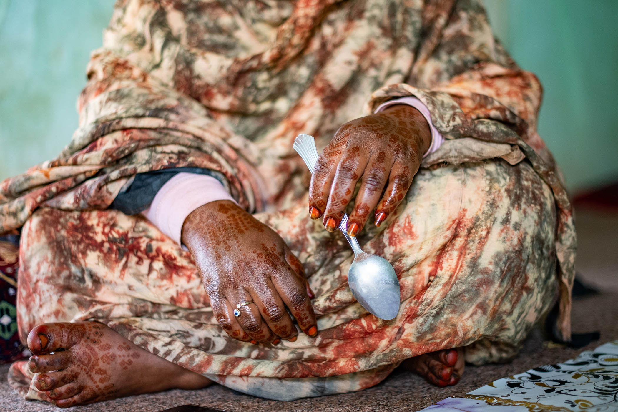 Hajah’s hennaed hands and feet at her divorce party.
