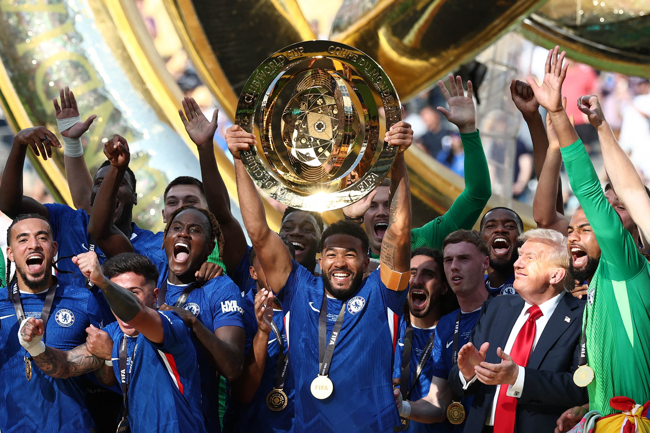 Trump walked off the pitch with Chelsea’s FIFA Club World Cup after their victory ceremony in July