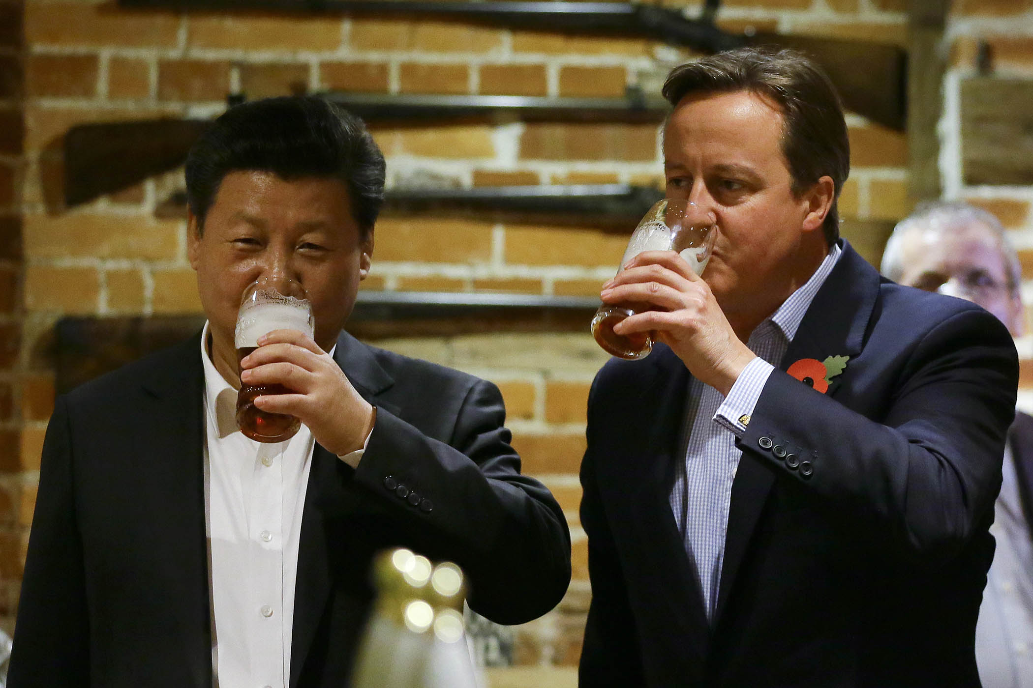 David Cameron and Xi Jinping drink pints of beer at The Plough pub in Princes Risborough during the Chinese president’s 2015 state visit