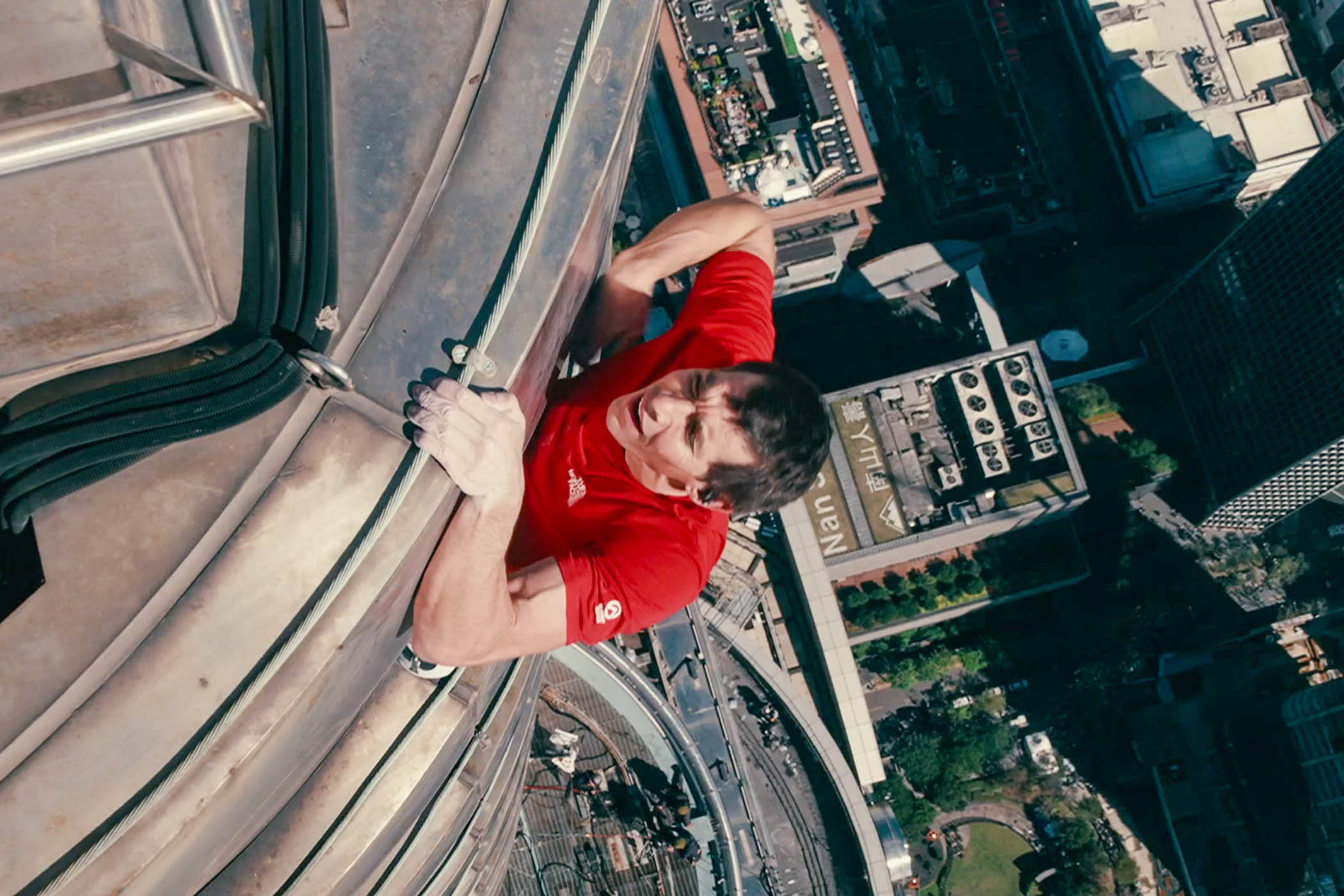 Honnold nears the top of the 101-storey building.