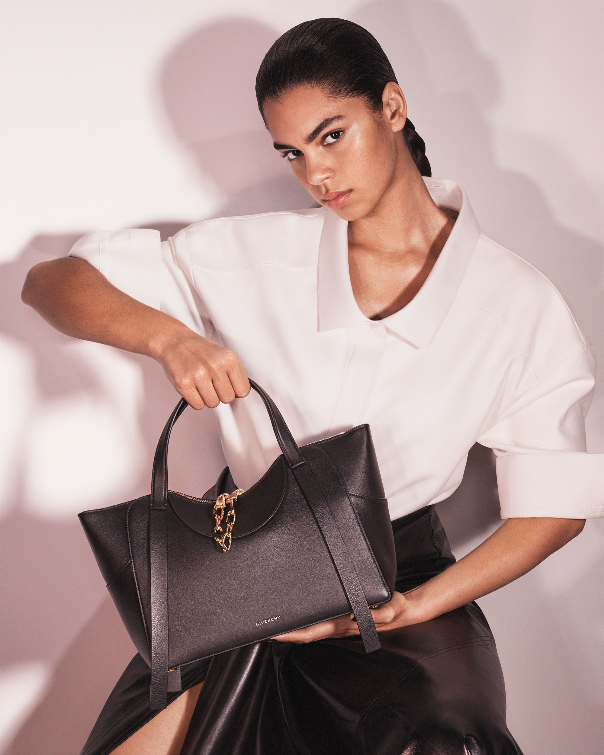 GRAB IT AND GOGivenchy has unveiled a new style of handbag under the creative direction of Sarah Burton. The Snatch bag slips naturally into the language of Burton’s previously shown ready-to-wear: sculptural, feminine and shaped around the body. The bag’s lines echo the cinch of a jacket, the shape of a waist or the curve of a bra. Available in three sizes in classic tones of black, aubergine, brown, and taupe, as well as vibrant shades of pink and red. From £2,350, Givenchy