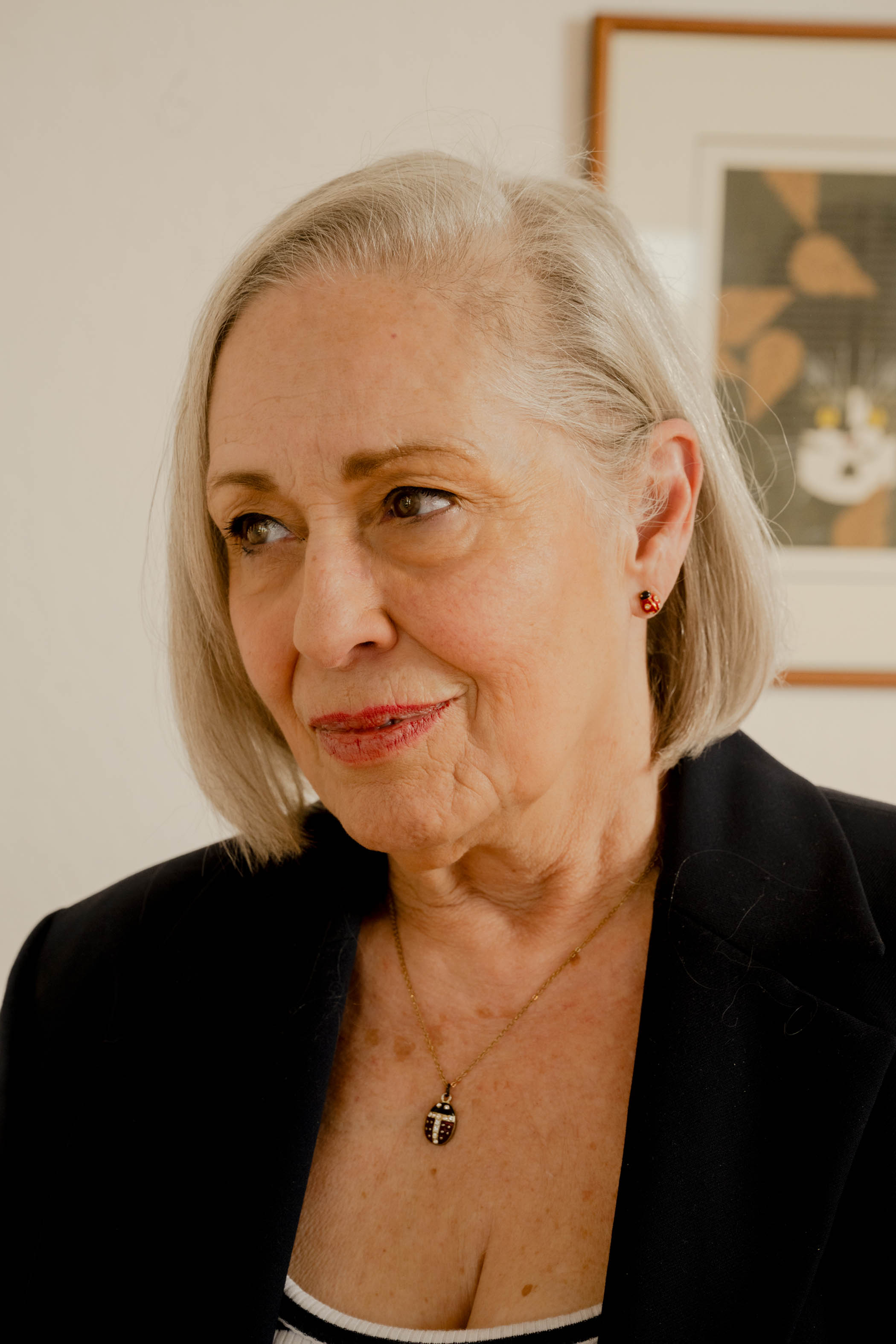 Mary Guibert wearing a necklace and earrings with ladybirds, which remind her of her son, Jeff Buckley