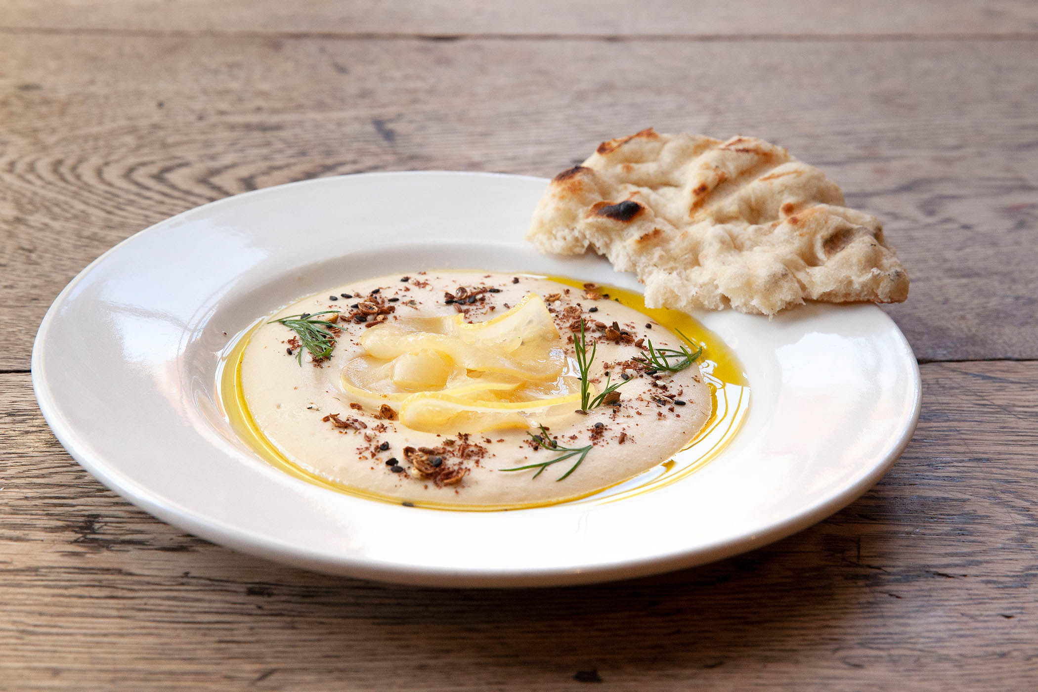 Grilled sourdough flatbread, cannellini bean dip