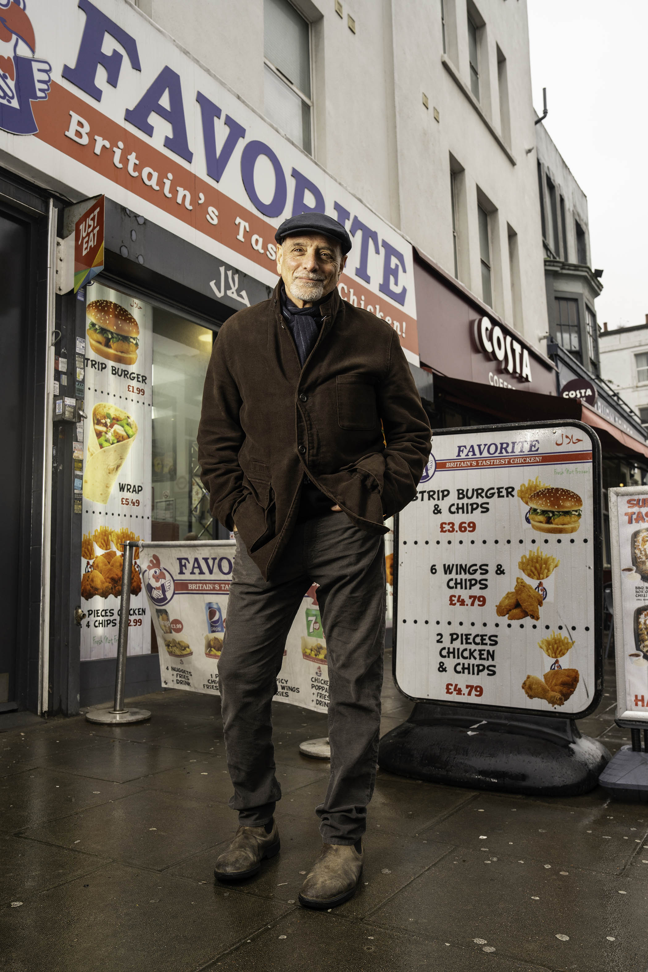 Schlosser outside a fast-food shop on London’s Kilburn High Road