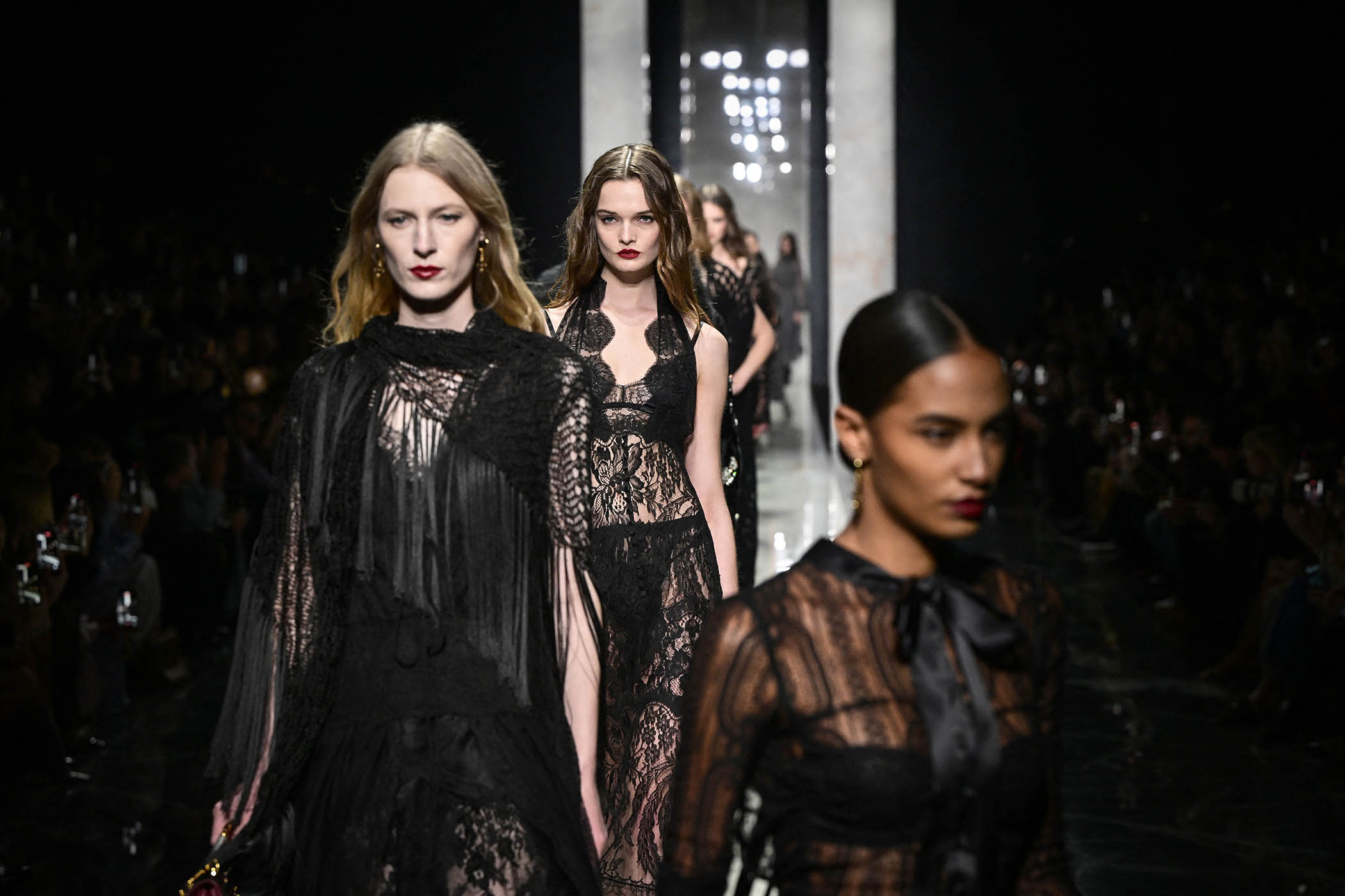 Models in Dolce & Gabbana’s underwear as outerwear on the catwalk in Milan