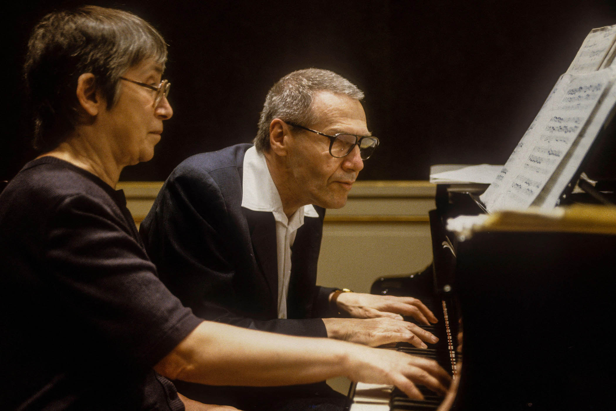 ‘Played in that same, intimate way’: Kurtág and his wife Márta play at an upright piano in 1991. Main image: Víkingur Ólafsson and his wife Halla Oddný Magnúsdóttir perform Gottes Zeit ist die allerbeste Zeit in homage