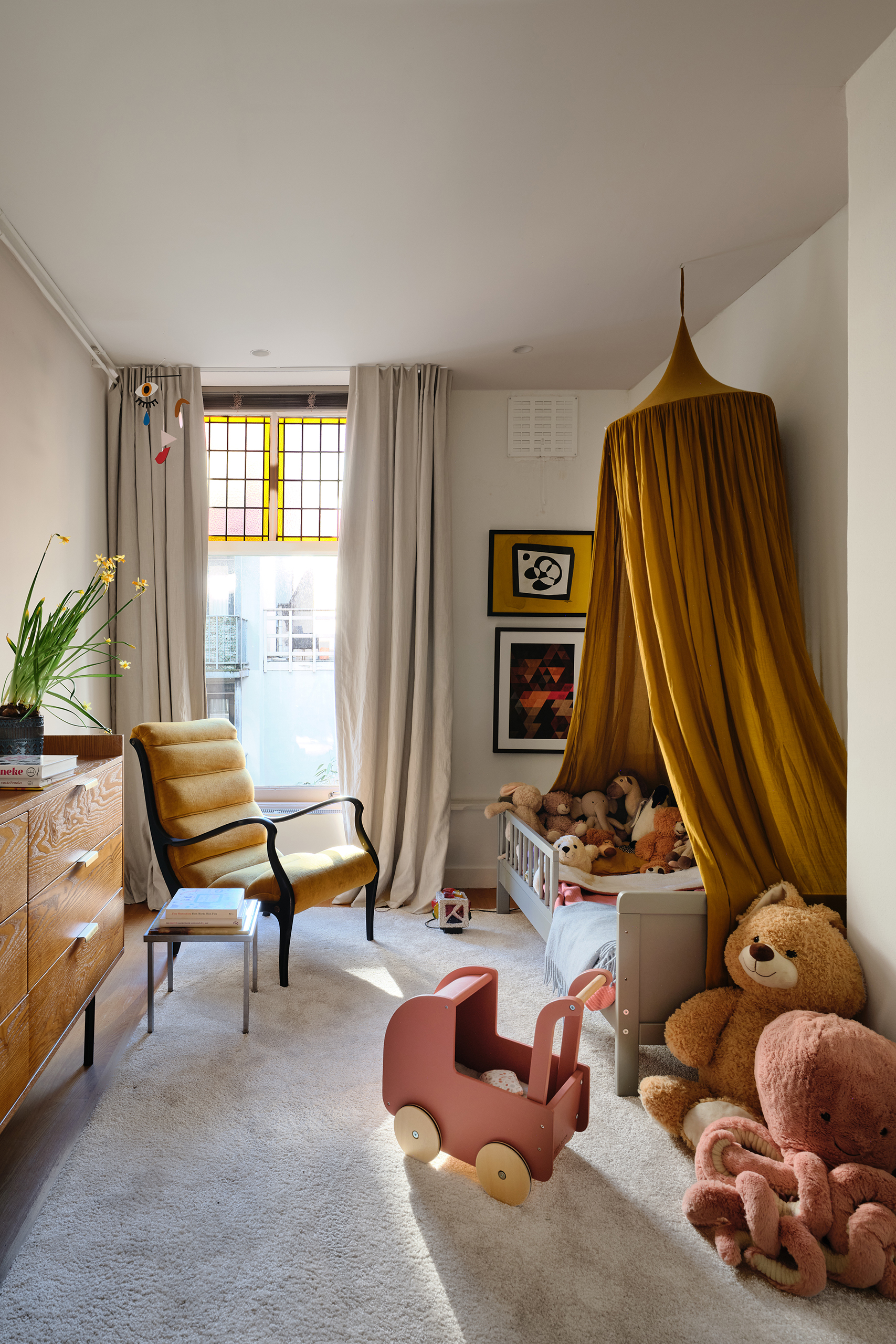 Child’s play: the couple prioritise happiness at home: their lucky young daughter even has a canopied bed