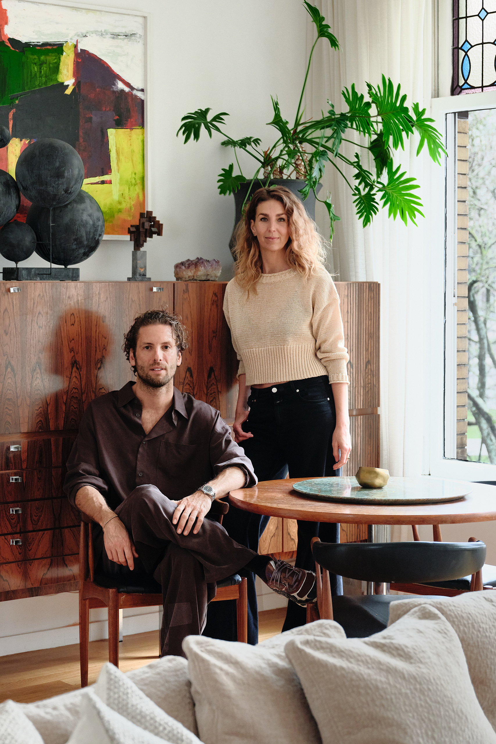 ‘You feel as if you’re living in the trees’: Joyce Urbanus and Dax Roll let the light flood in from a south-facing window. They like to mix different kinds of wood in their flat