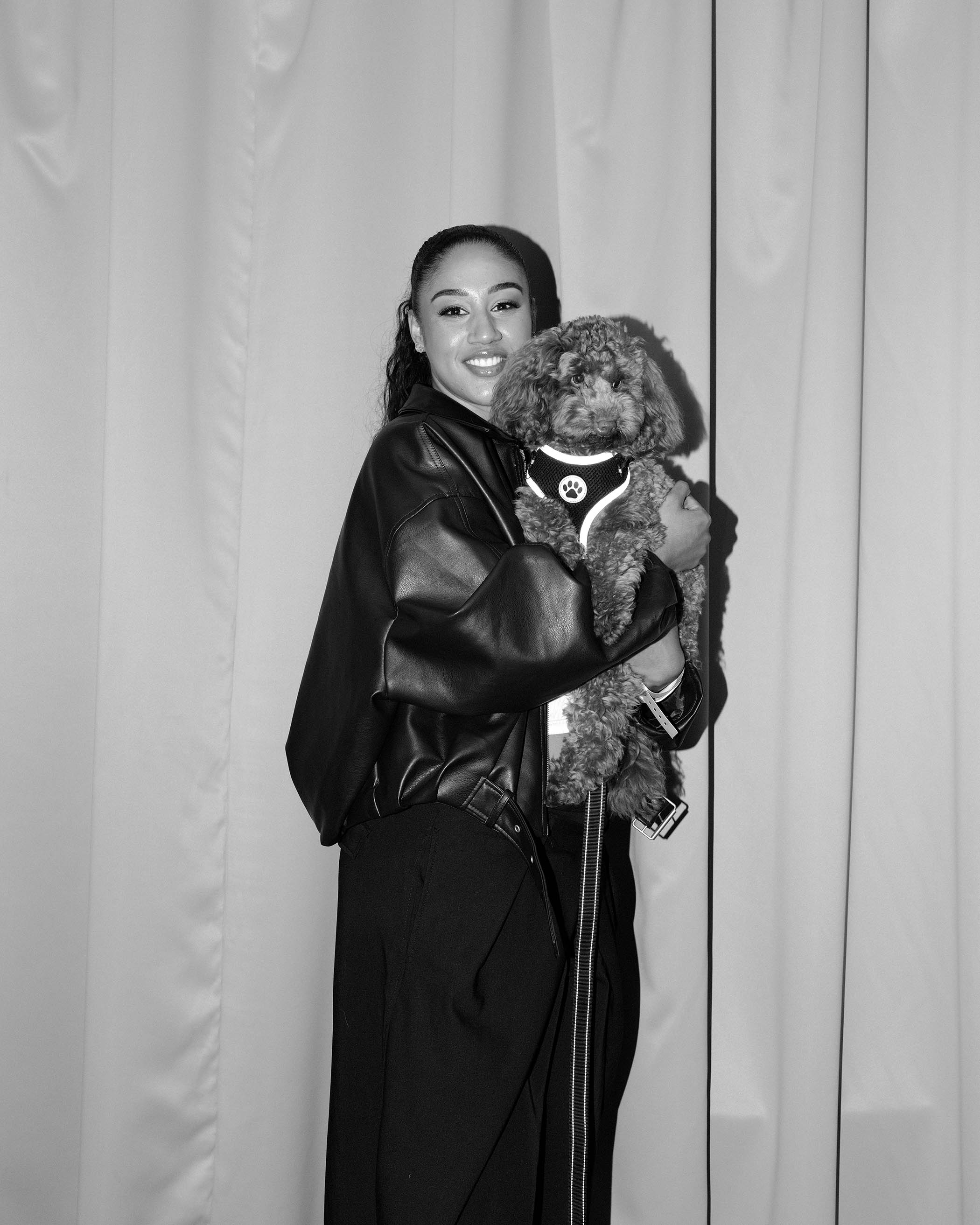 Manchester United player Gabby George with her dog Ralph