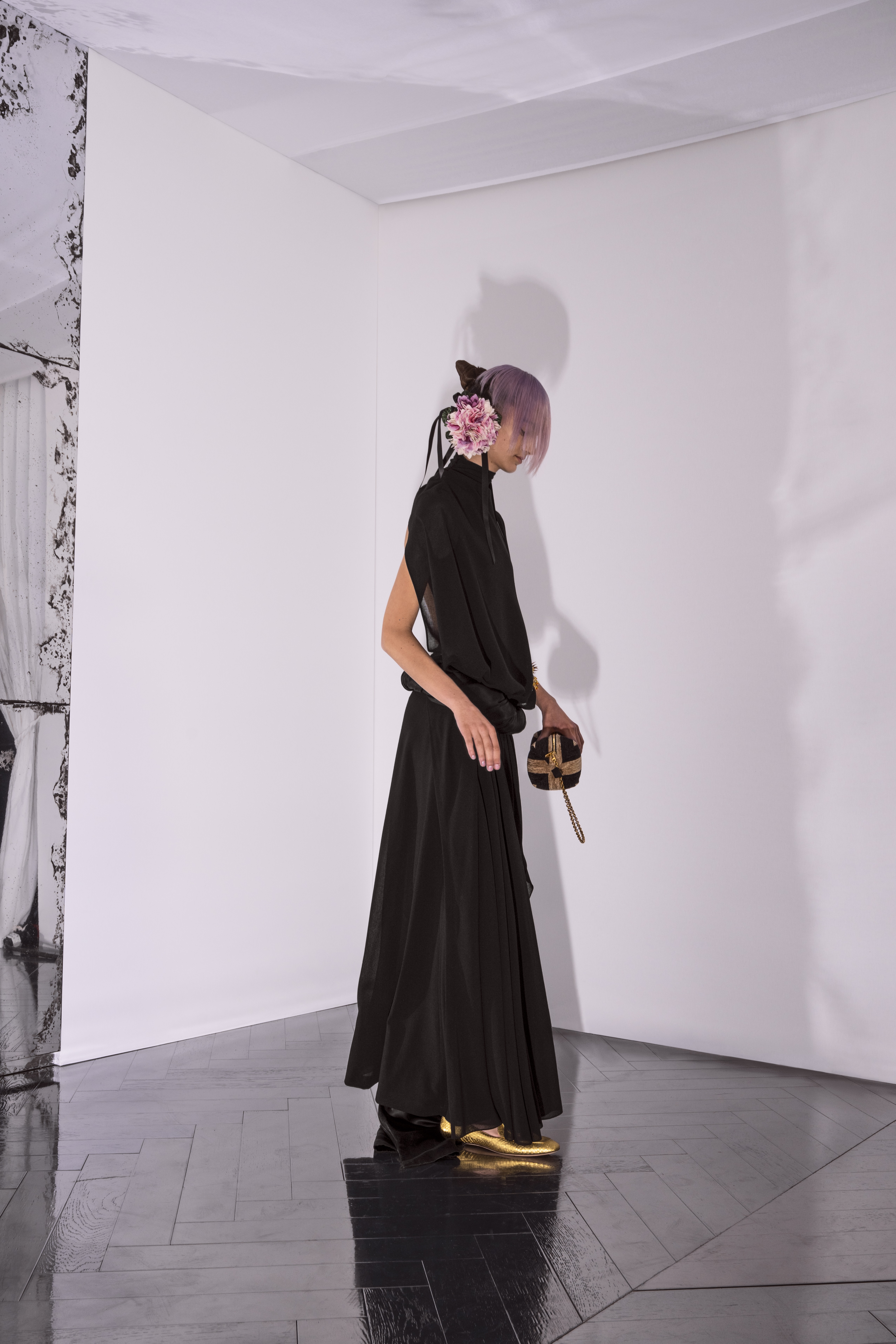 BOUDOIR Long dress in black wool gauze with a twisted silk satin belt, with bead, sequin and silk thread-embroidered buttercup yellow and orange wildflower bouquets
