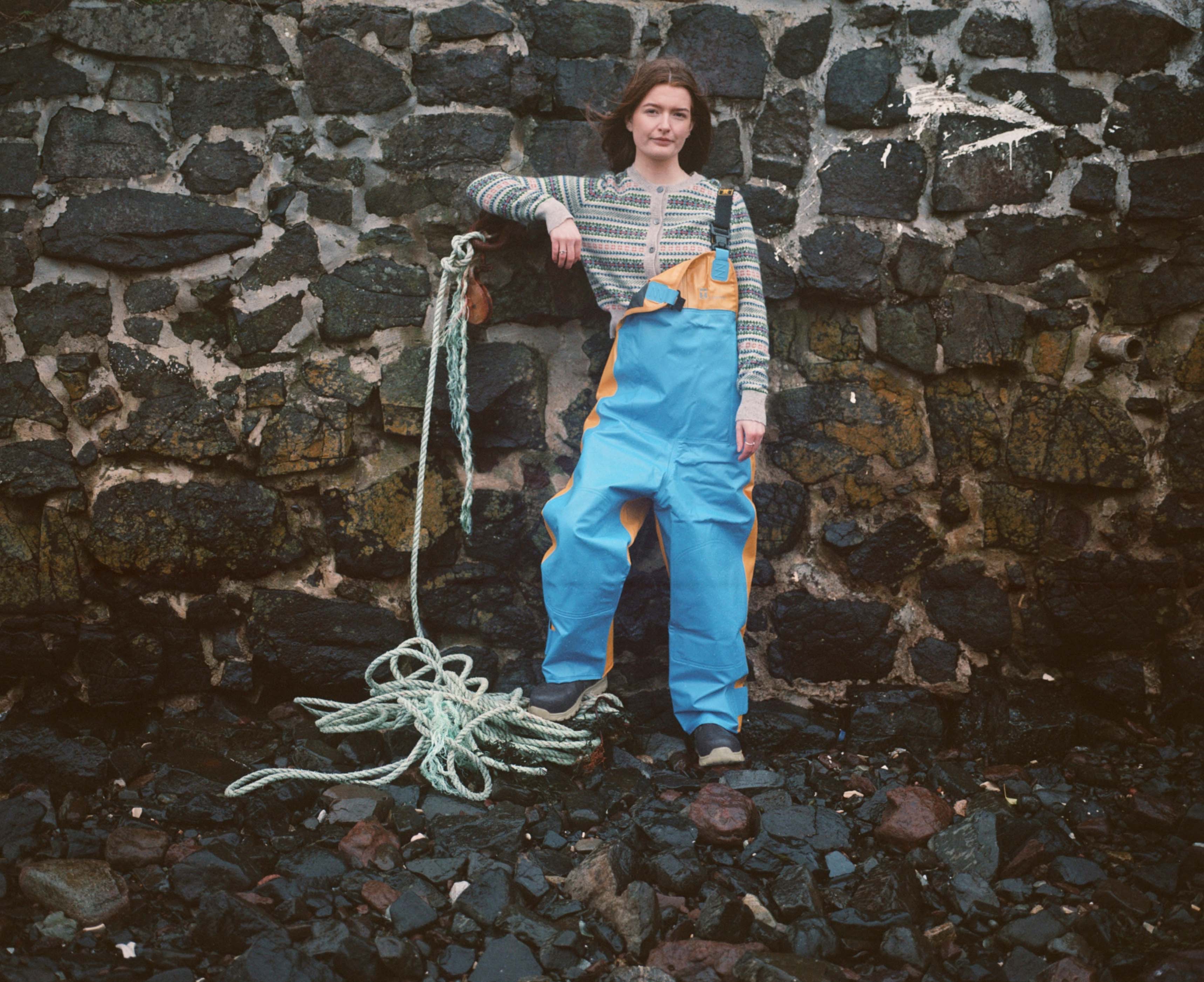 Brooke Lamondd, 21, fisher. Brooke has lived on Skye all her Life. She wears cashmere Fair Isle cardigan by Brora