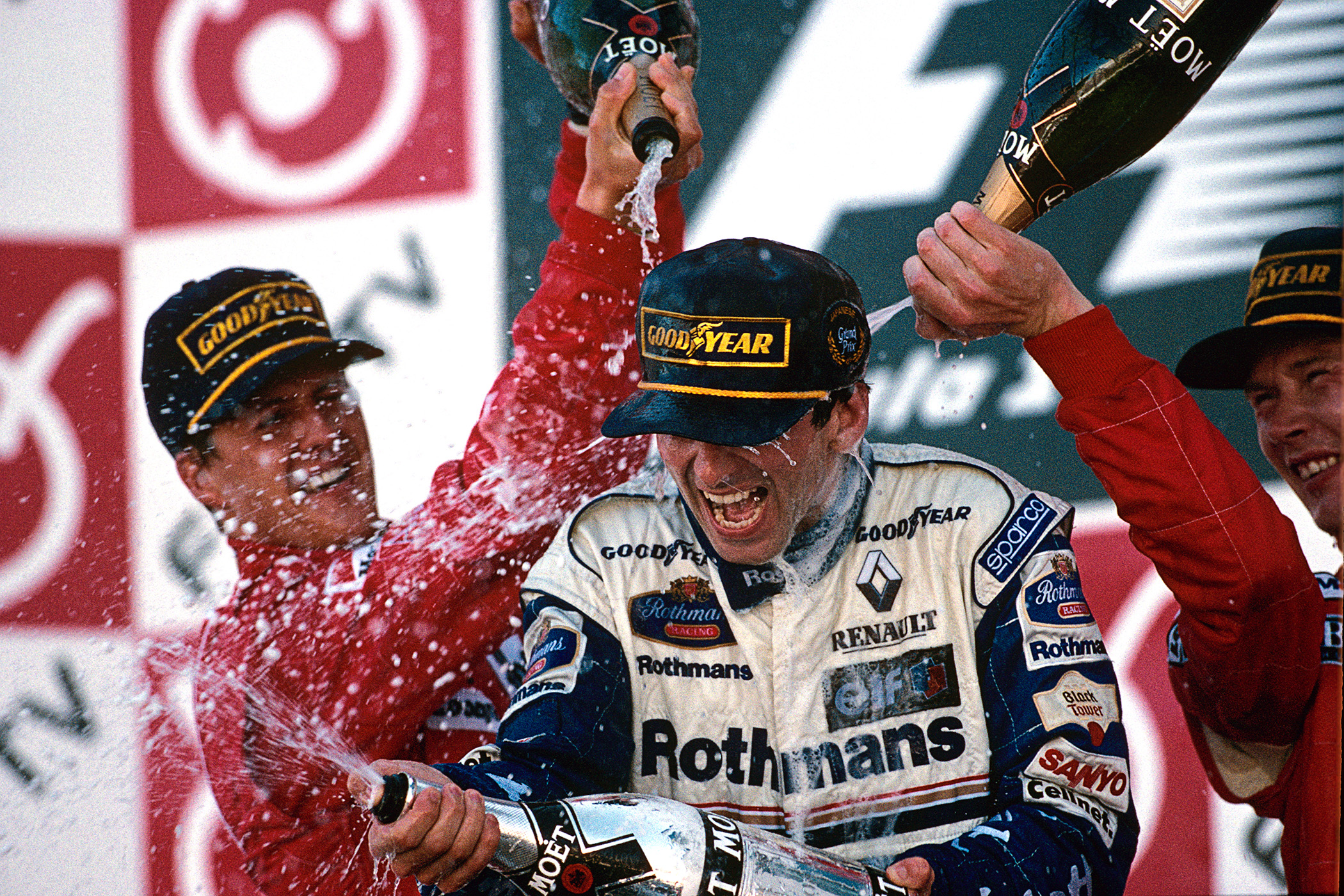Hill with Michael Schumacher and Mika Hakkinen at the Grand Prix of Japan in 1996