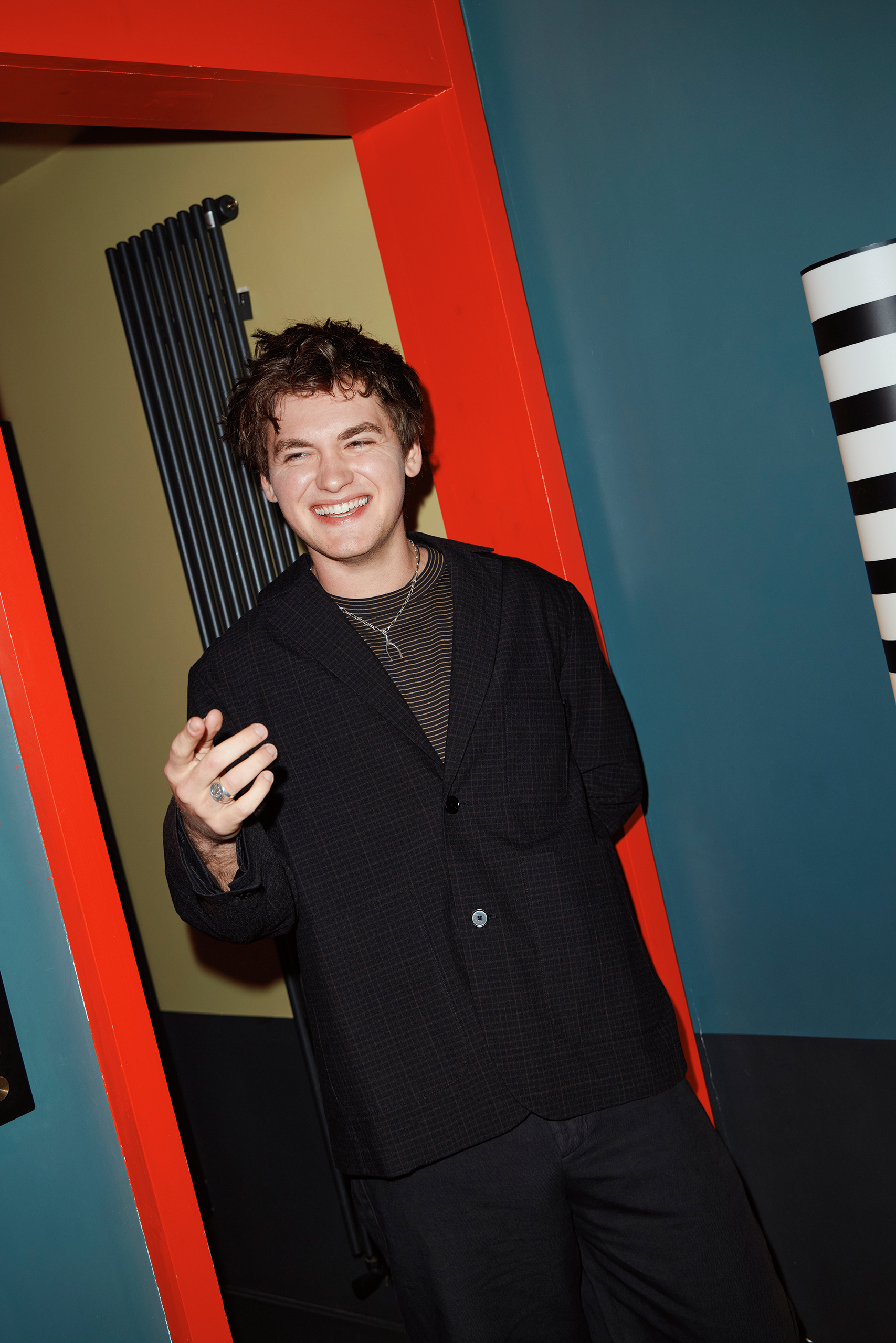 Joe Anders wears blazer and trousers both Toast and T-shirt U by Uniqlo