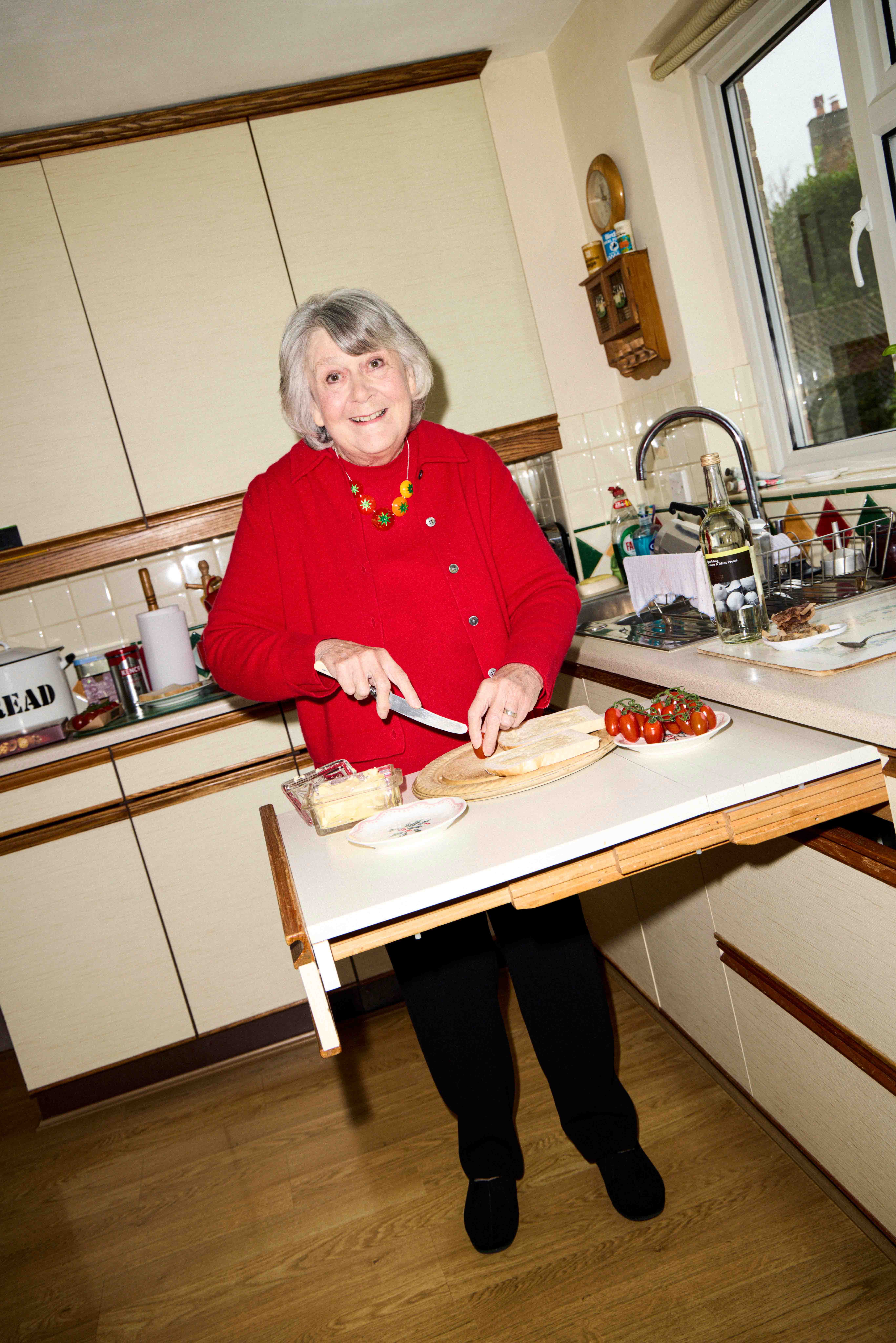 Teresa wears cashmere collar cardigan, £109, and crew neck, £99, both by John Lewis; and tomato link necklace, £95, by Tatty Devine