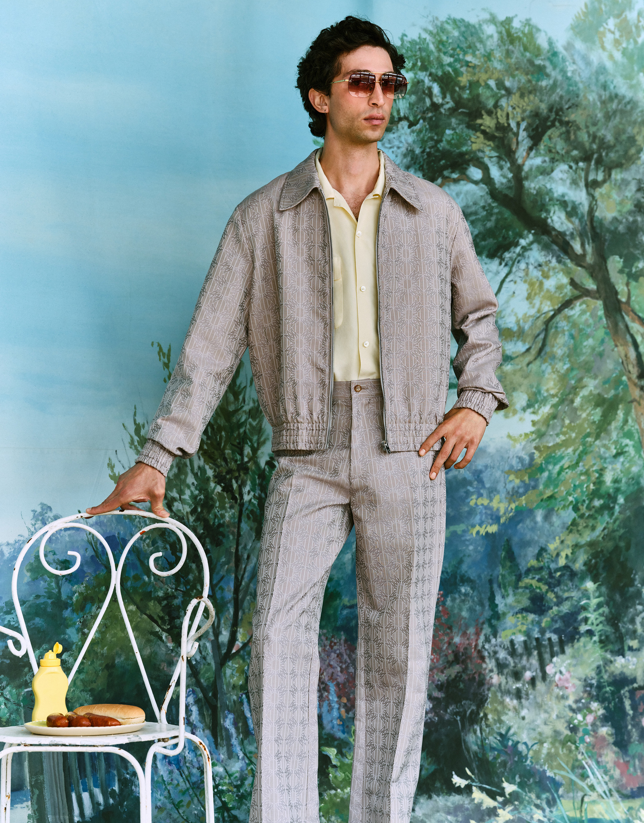 Logo jacket and trousers both Amiri; yellow shirt, Cos; aviators, Linda Farrow