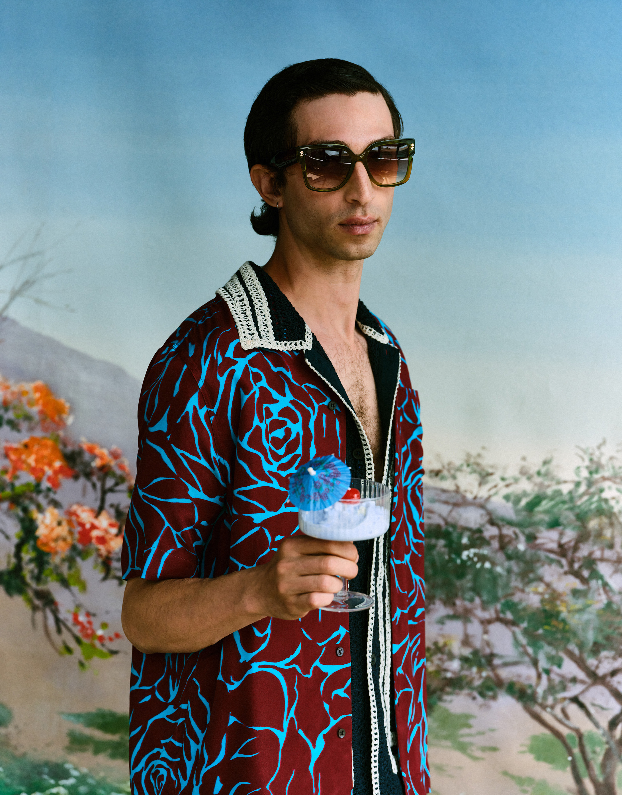 Shirt, and shorts both Dries Van Noten; sunglasses, Etro; (and, seen in main image: flip flops, Marks and Spencer)