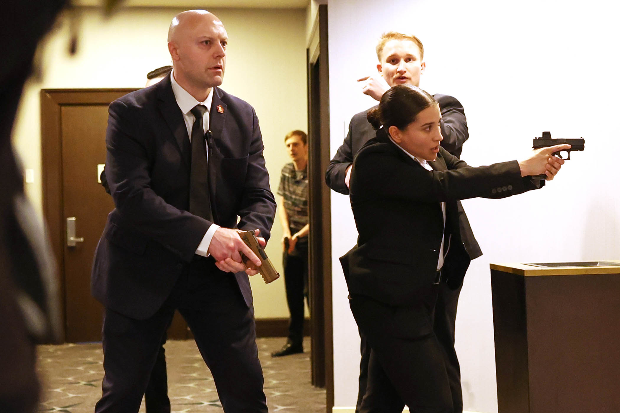 Secret service agents respond during the White House Correspondents Dinner, Saturday, April 25, 2026