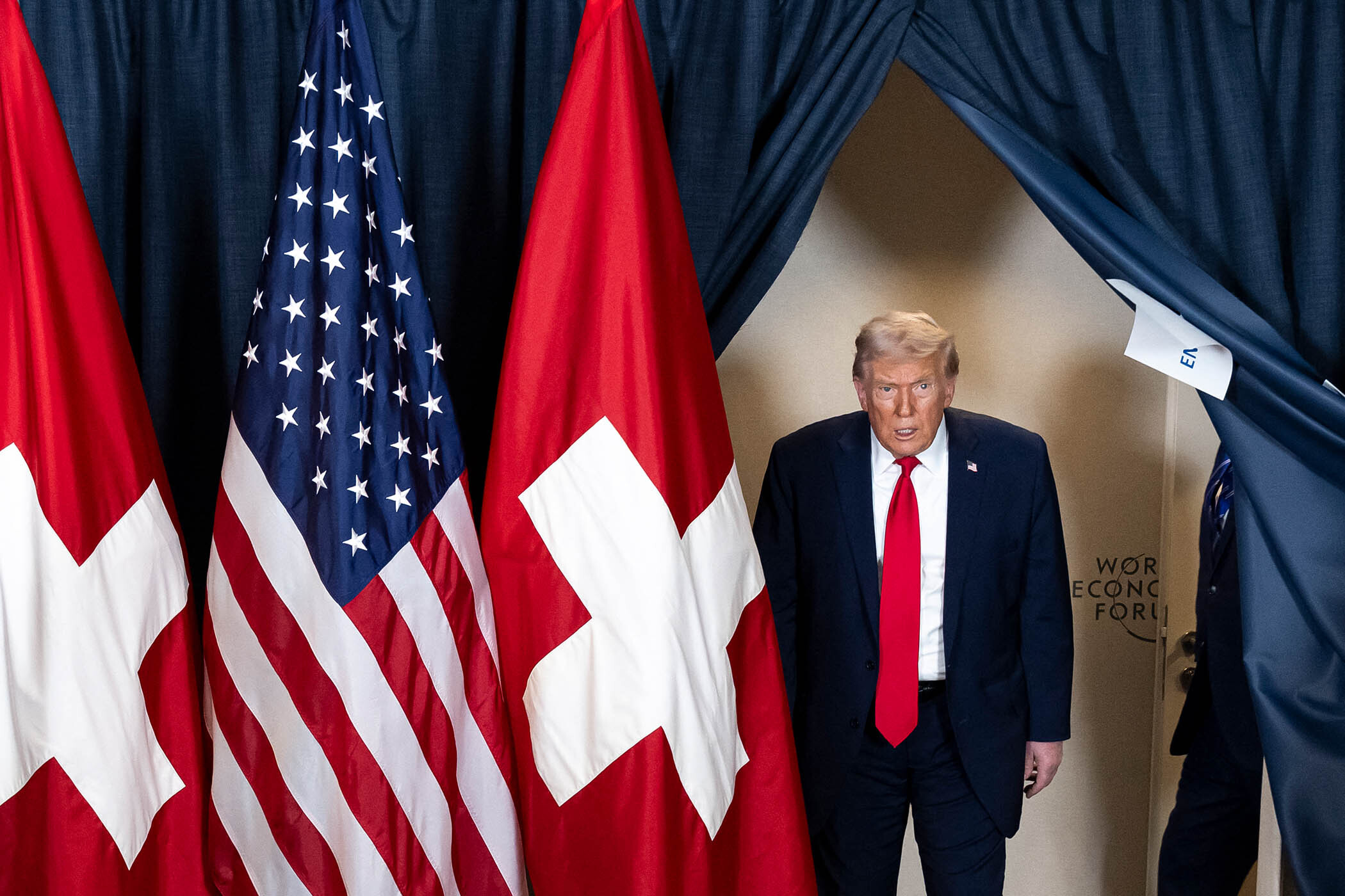 Belligerent Trump backs off on Greenland and tariffs in Davos climbdown