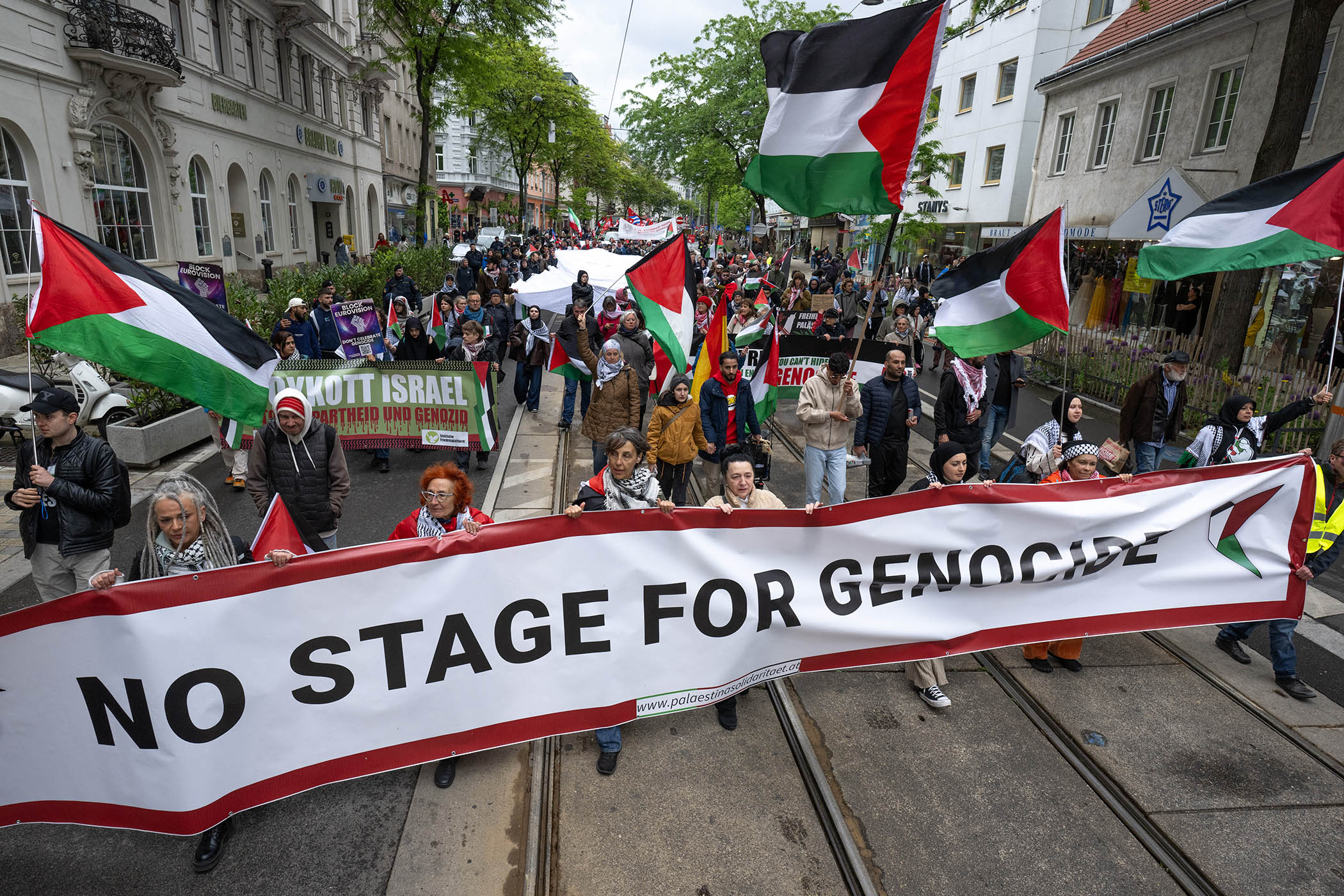 People take part in a demonstration against Israel’s participation in the Eurovision Song Contest, in Vienna, Austria