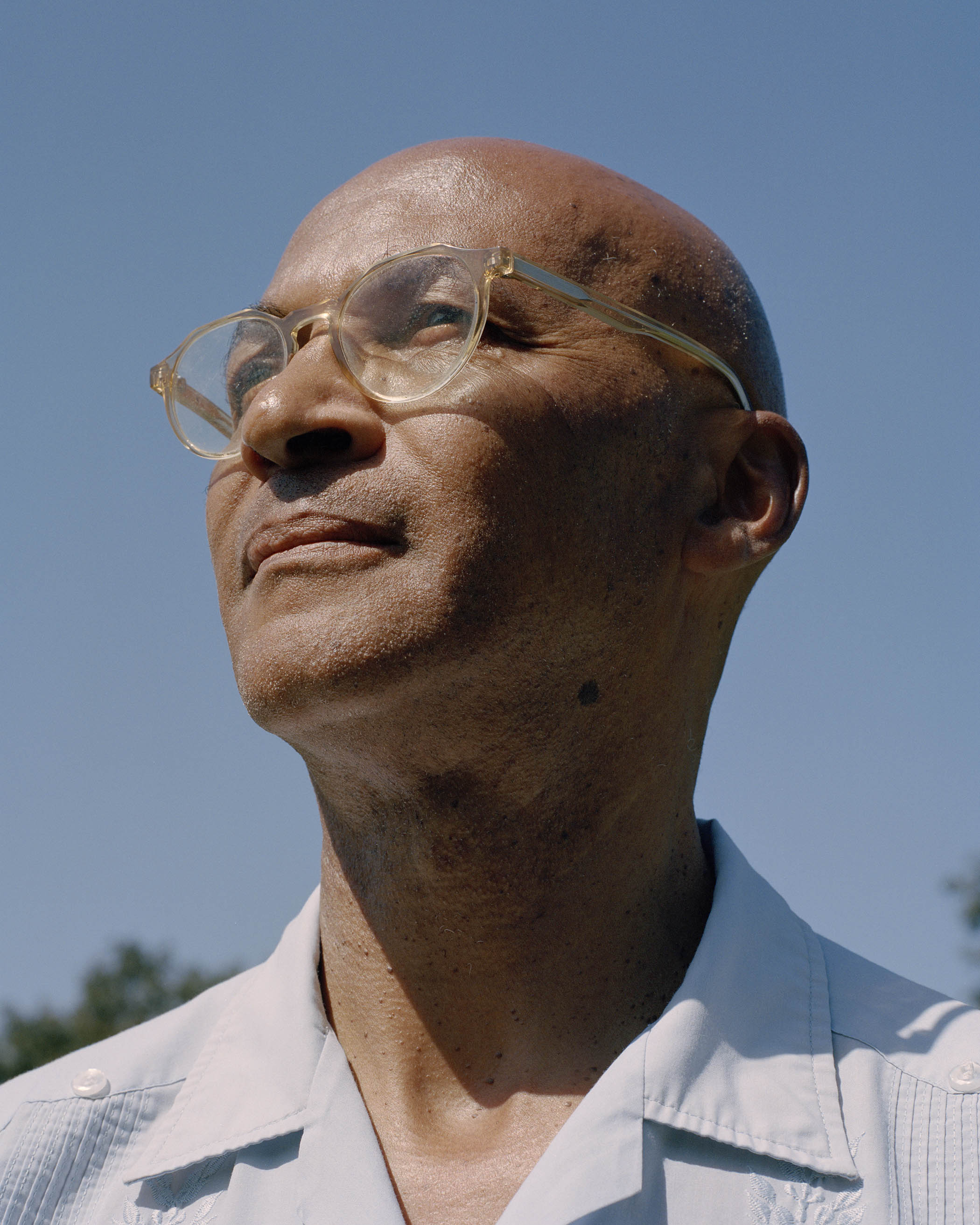 Above: Colin Grant; main picture: Grant outside his childhood home on the Farley Hill estate.