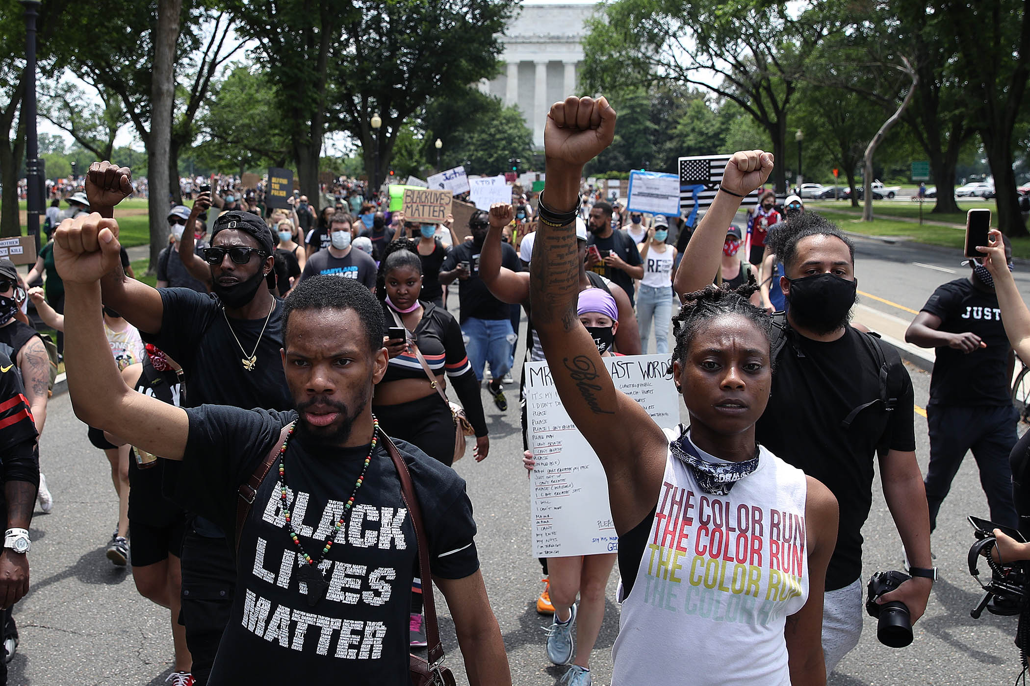 Demonstrators march near the Lincoln Memorial during a protest against police brutality and racism, Washington DC, 6 June 2020.
