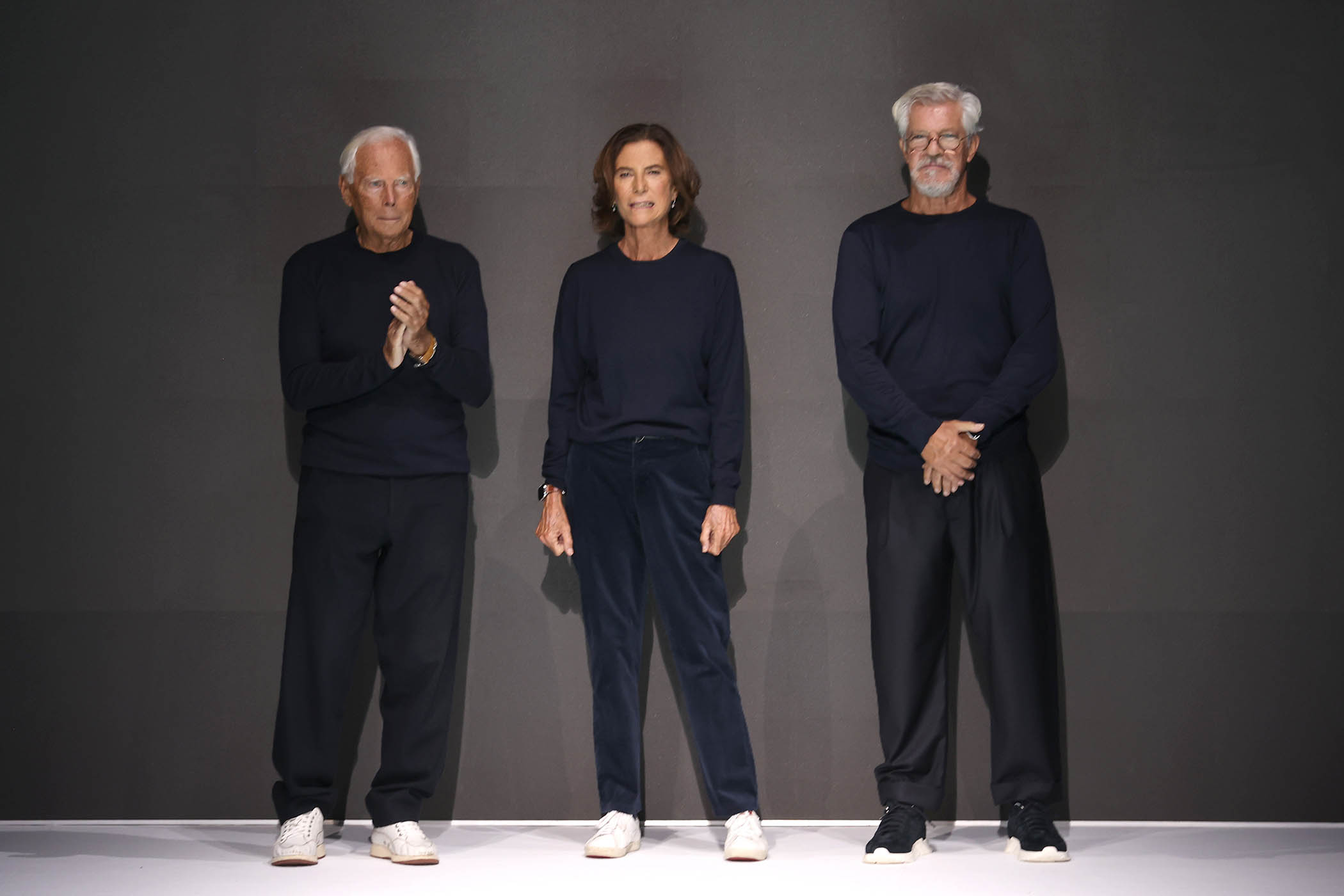 Triple force: Giorgio Armani with Silvana Armani and Leo dell'Orco at the end of the Milan Fashion Week show in 2021