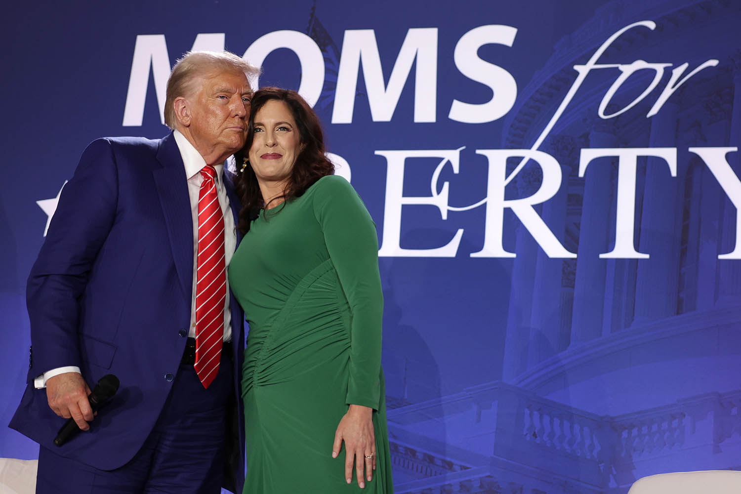 Donald Trump with Tiffany Justice, founder of Moms for Liberty in 2024