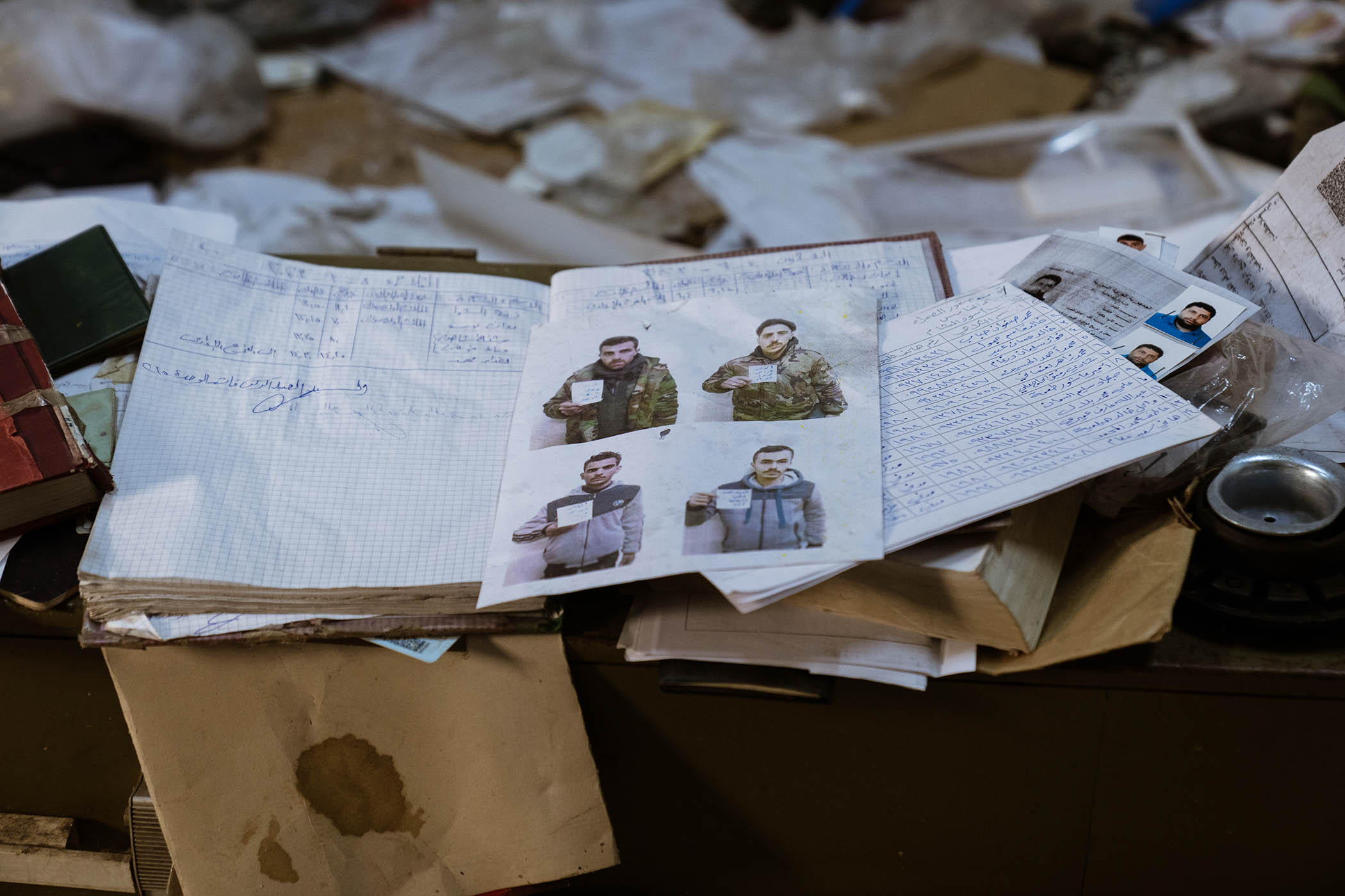 IDs and other items found in a torture and intelligence centre used by Syrian regime officers in Damascus.