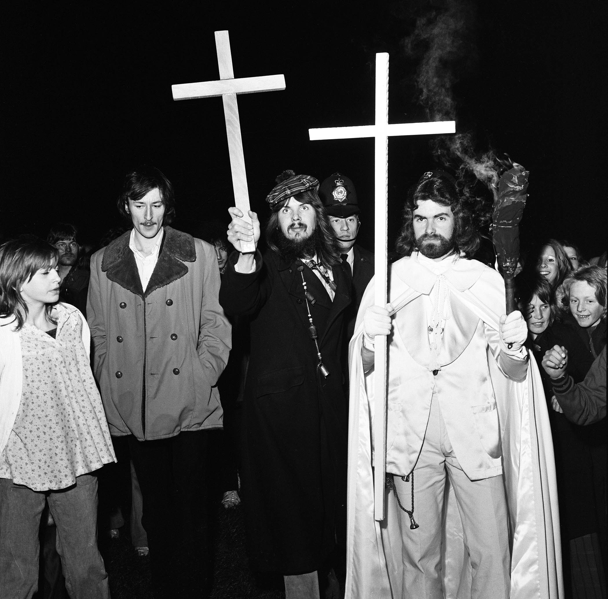 Seán Manchester escorted by police